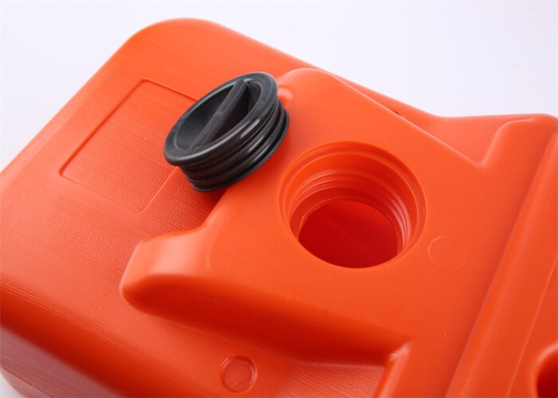 an abstract photo of a curved building with a blue sky in the background