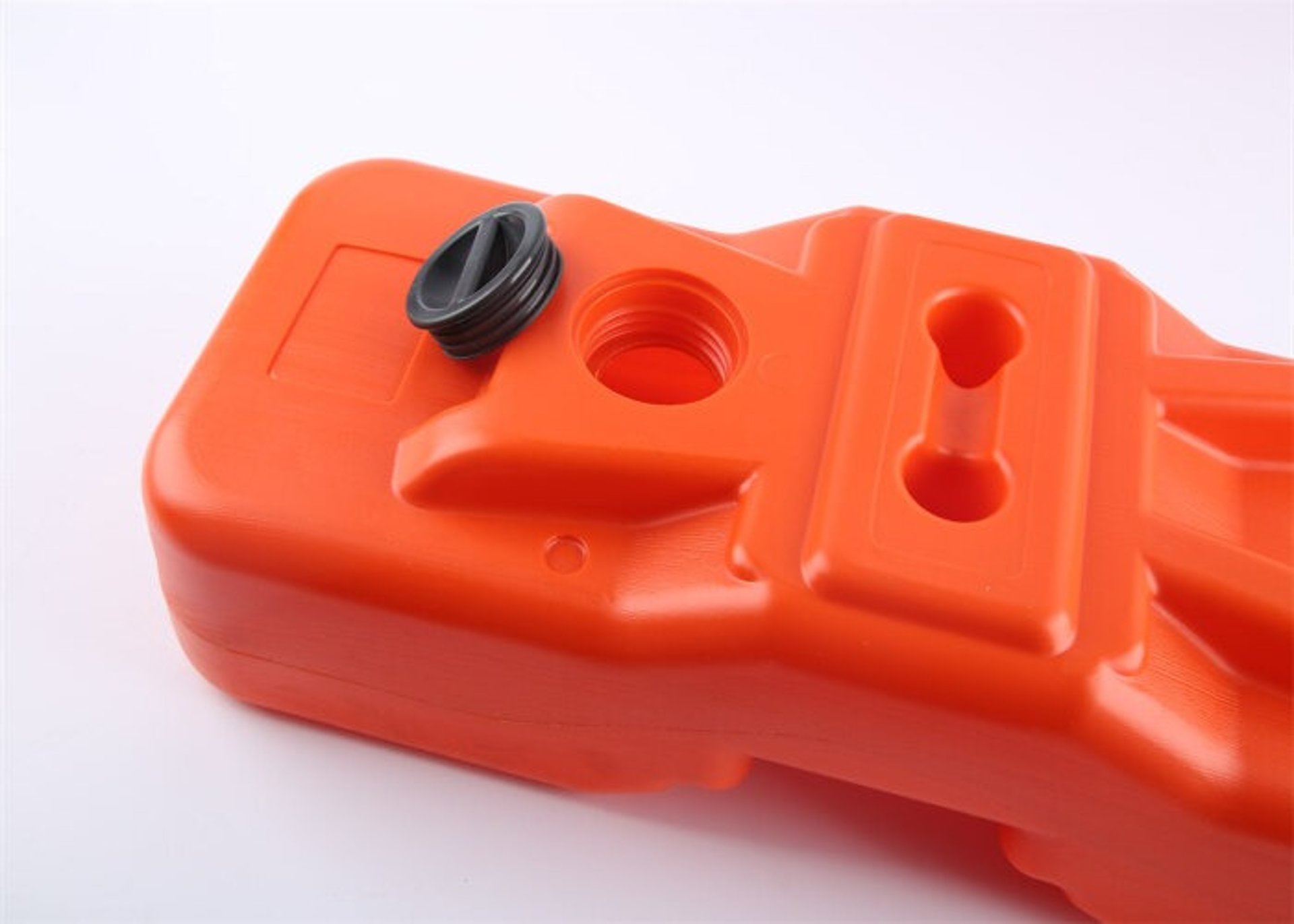 an abstract photo of a curved building with a blue sky in the background