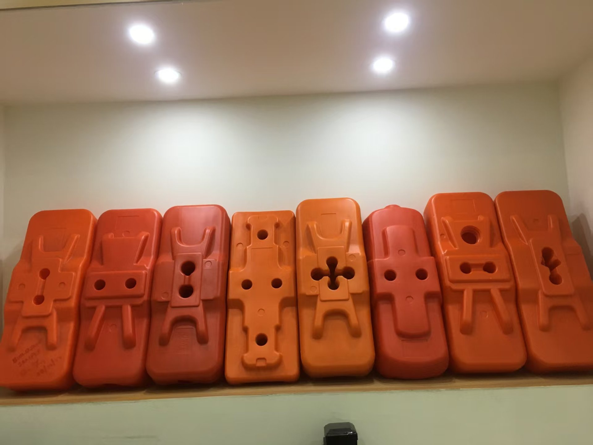 an abstract photo of a curved building with a blue sky in the background