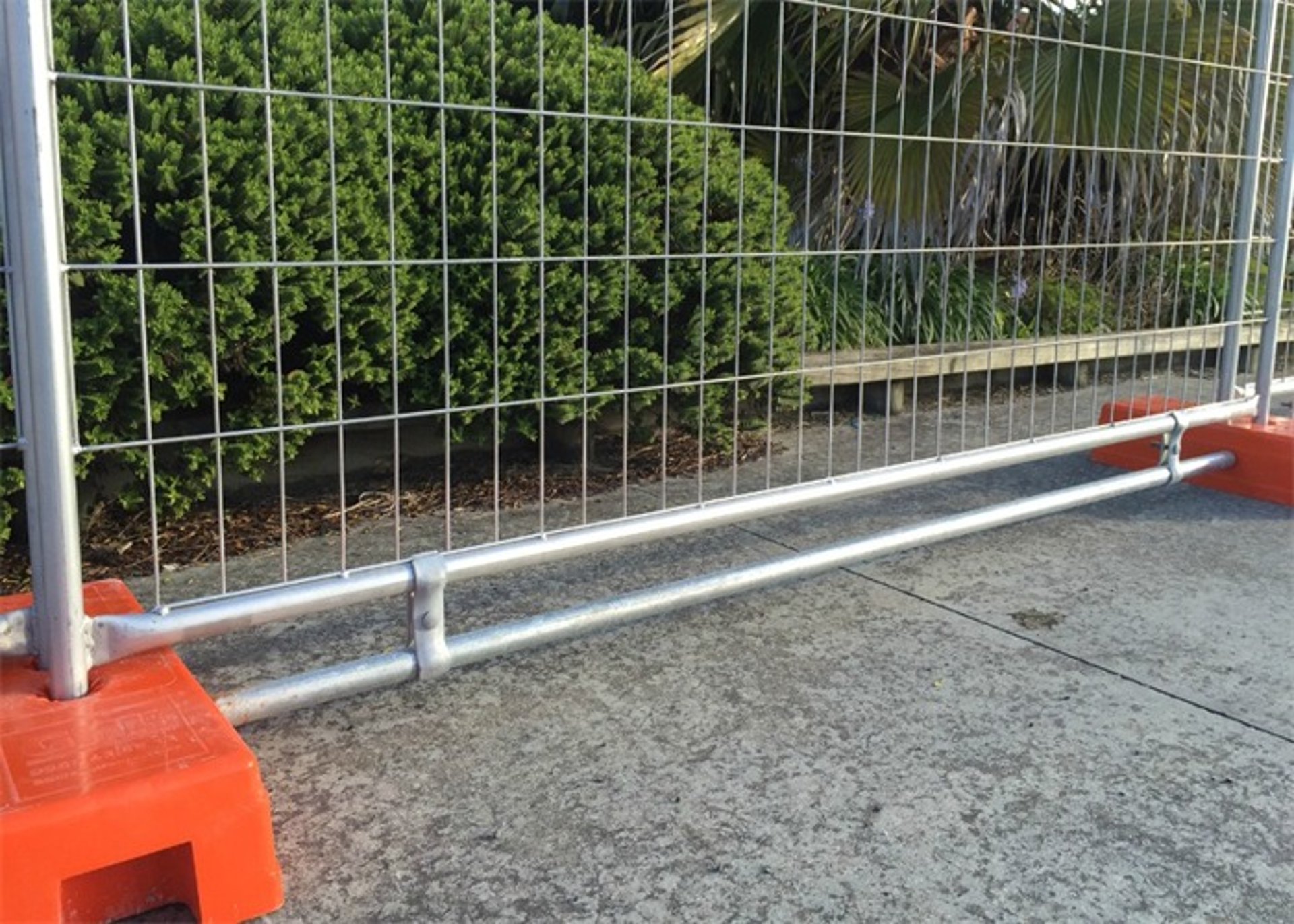 an abstract photo of a curved building with a blue sky in the background