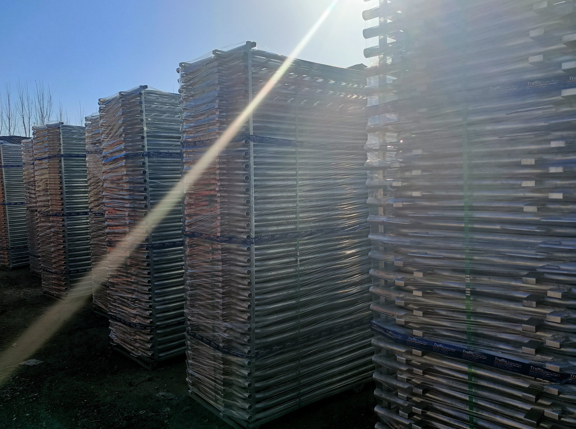 an abstract photo of a curved building with a blue sky in the background