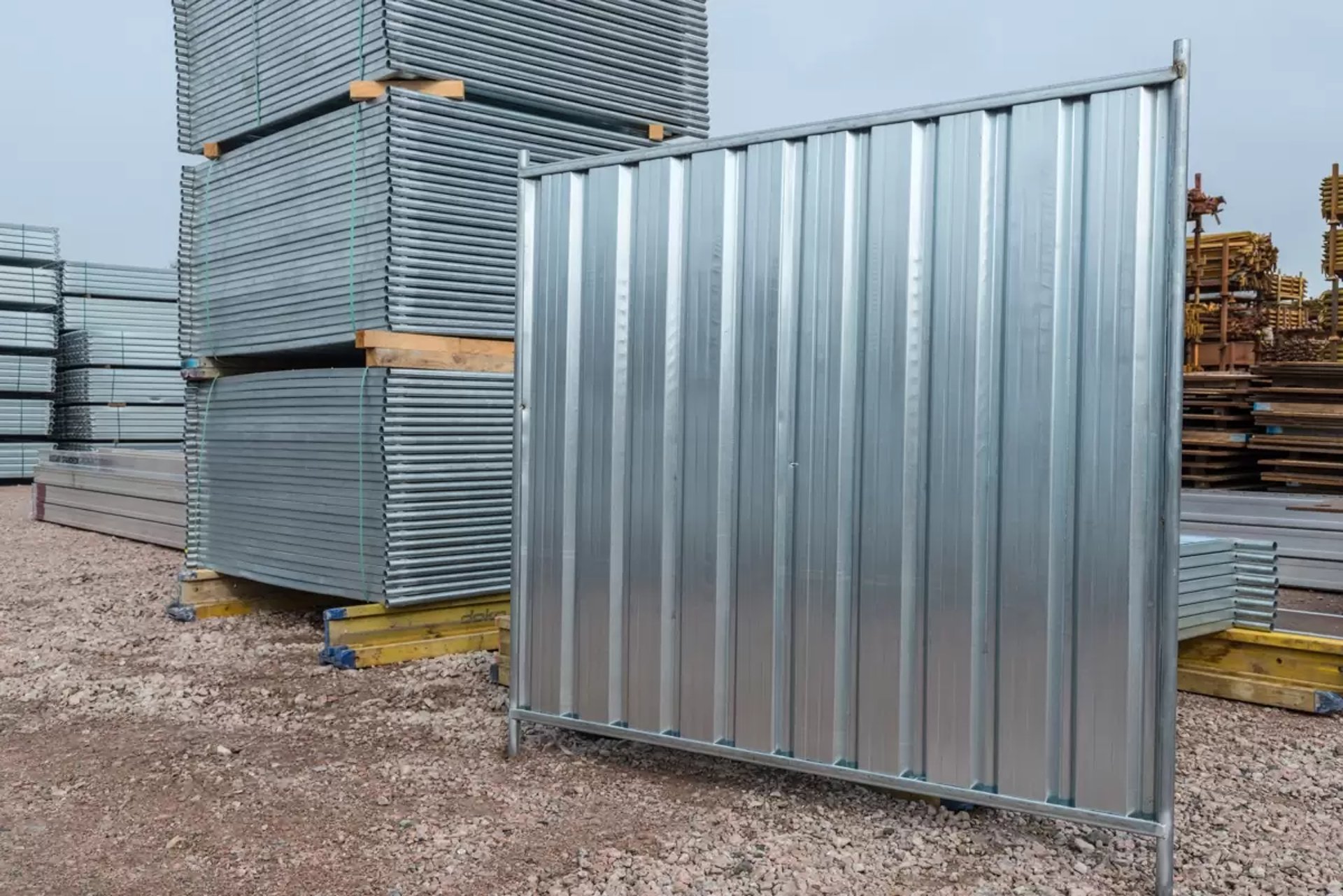 an abstract photo of a curved building with a blue sky in the background