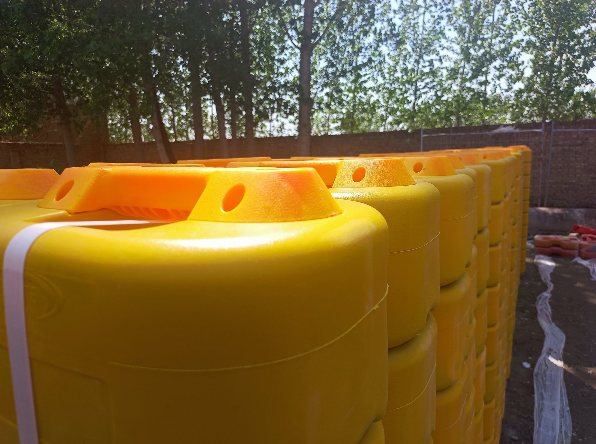 an abstract photo of a curved building with a blue sky in the background