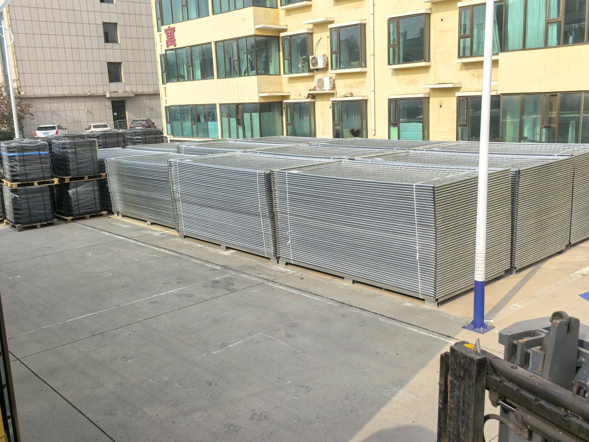 an abstract photo of a curved building with a blue sky in the background