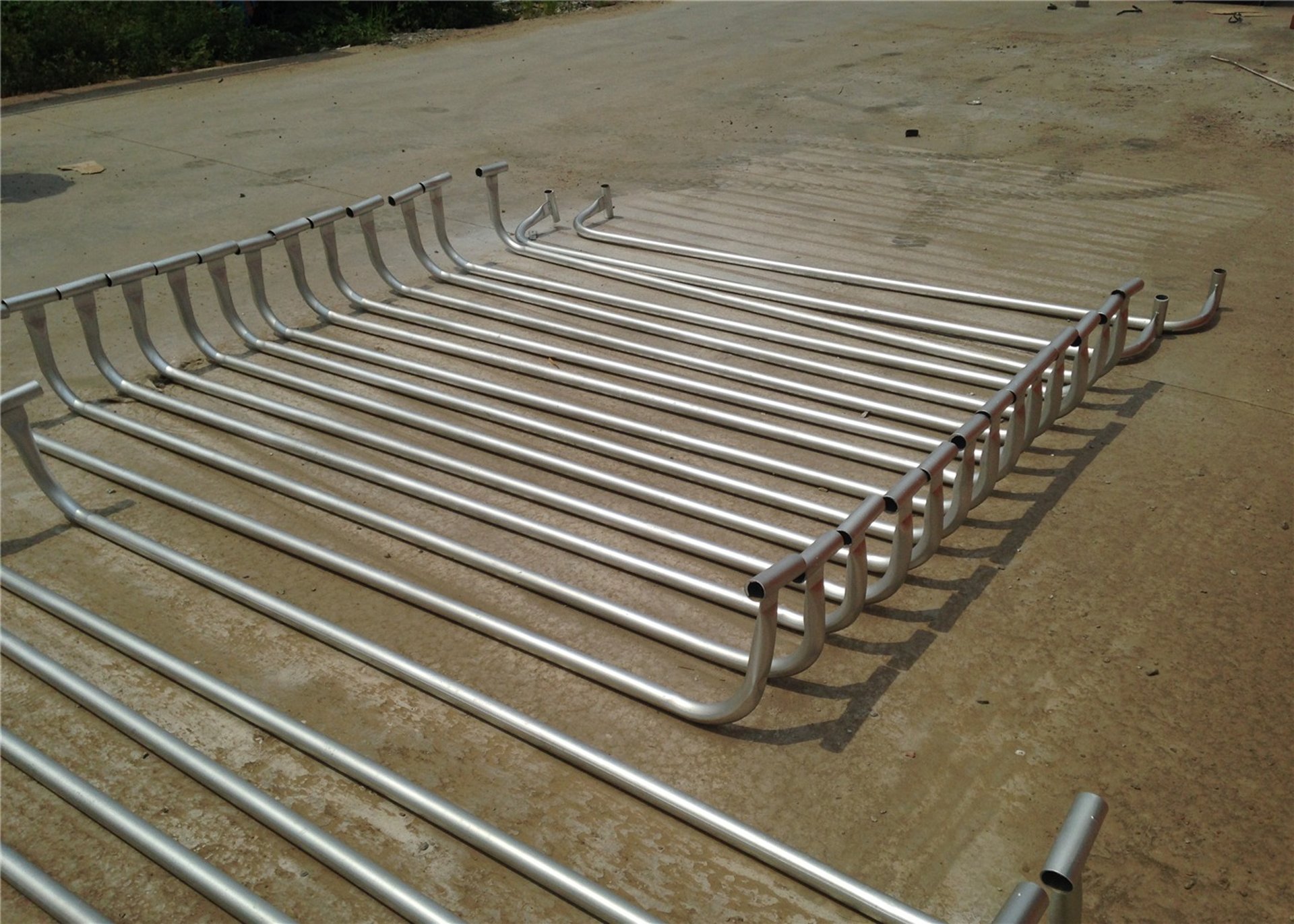 an abstract photo of a curved building with a blue sky in the background