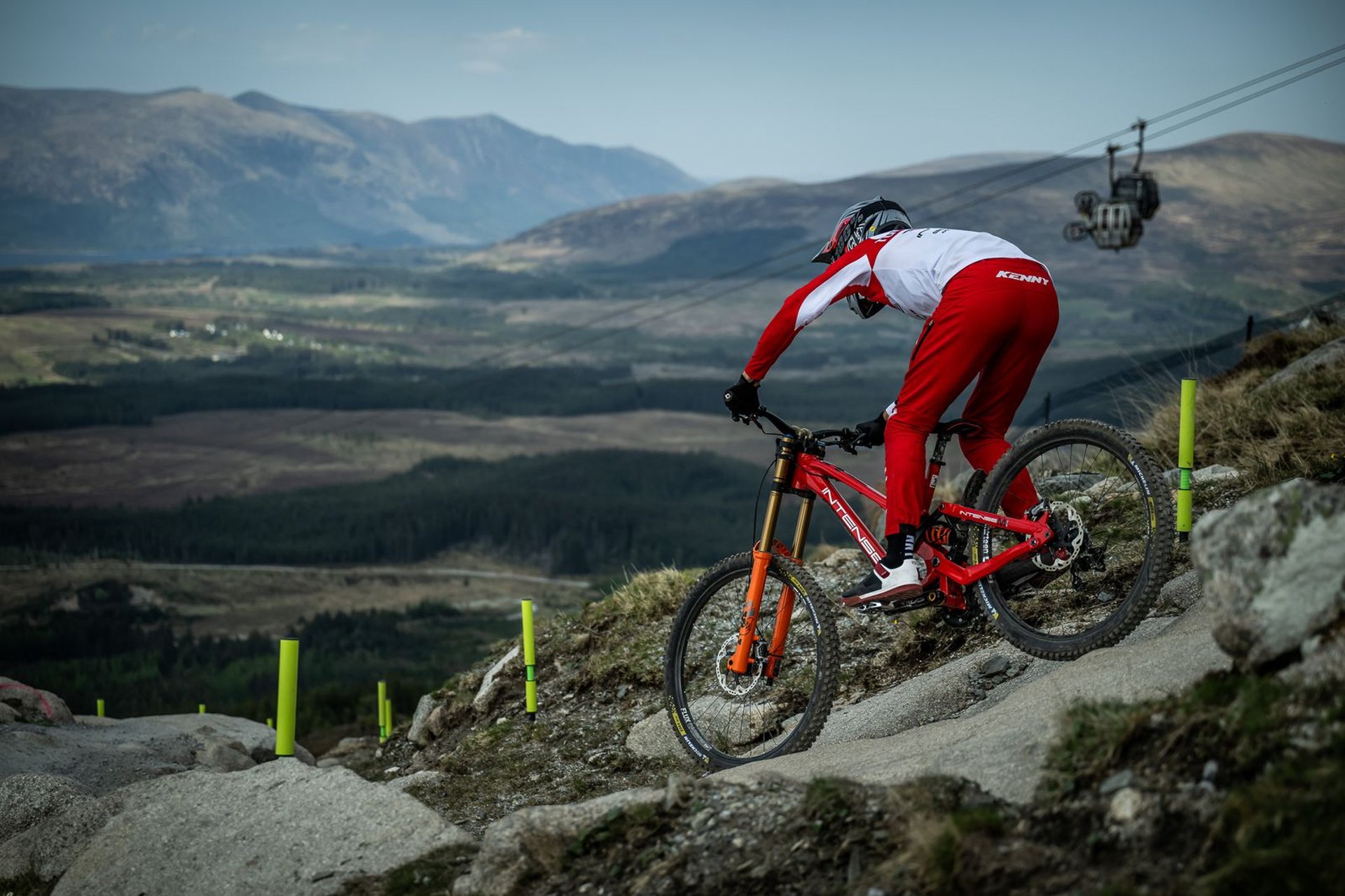person wearing grey knit sweater