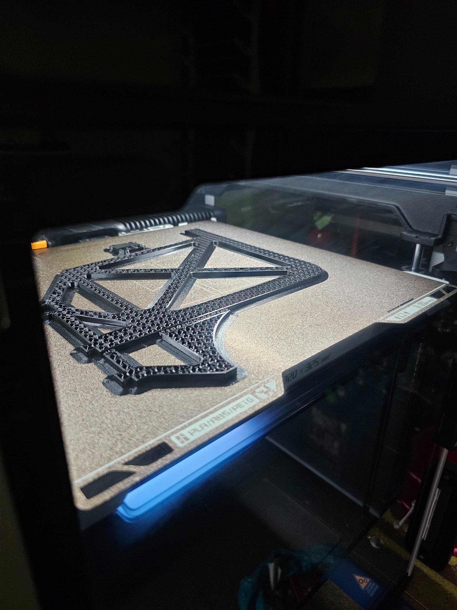 person near 3D printer