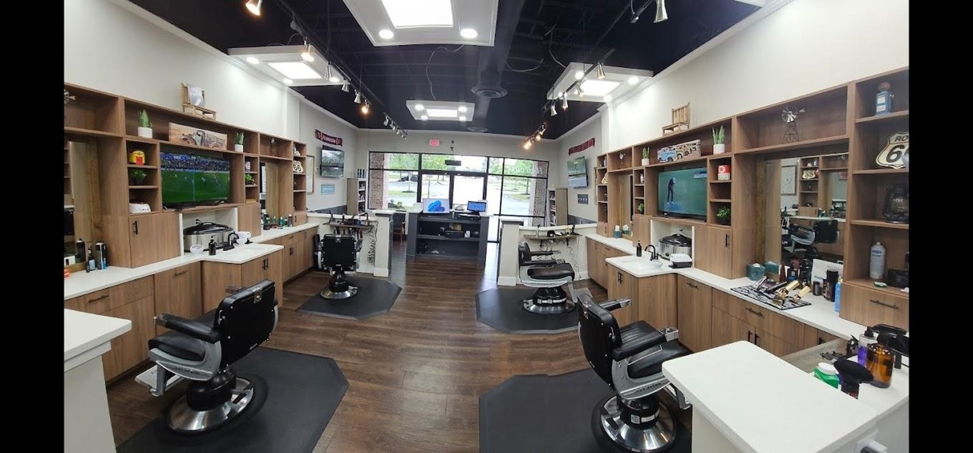 man sitting on barber's chair
