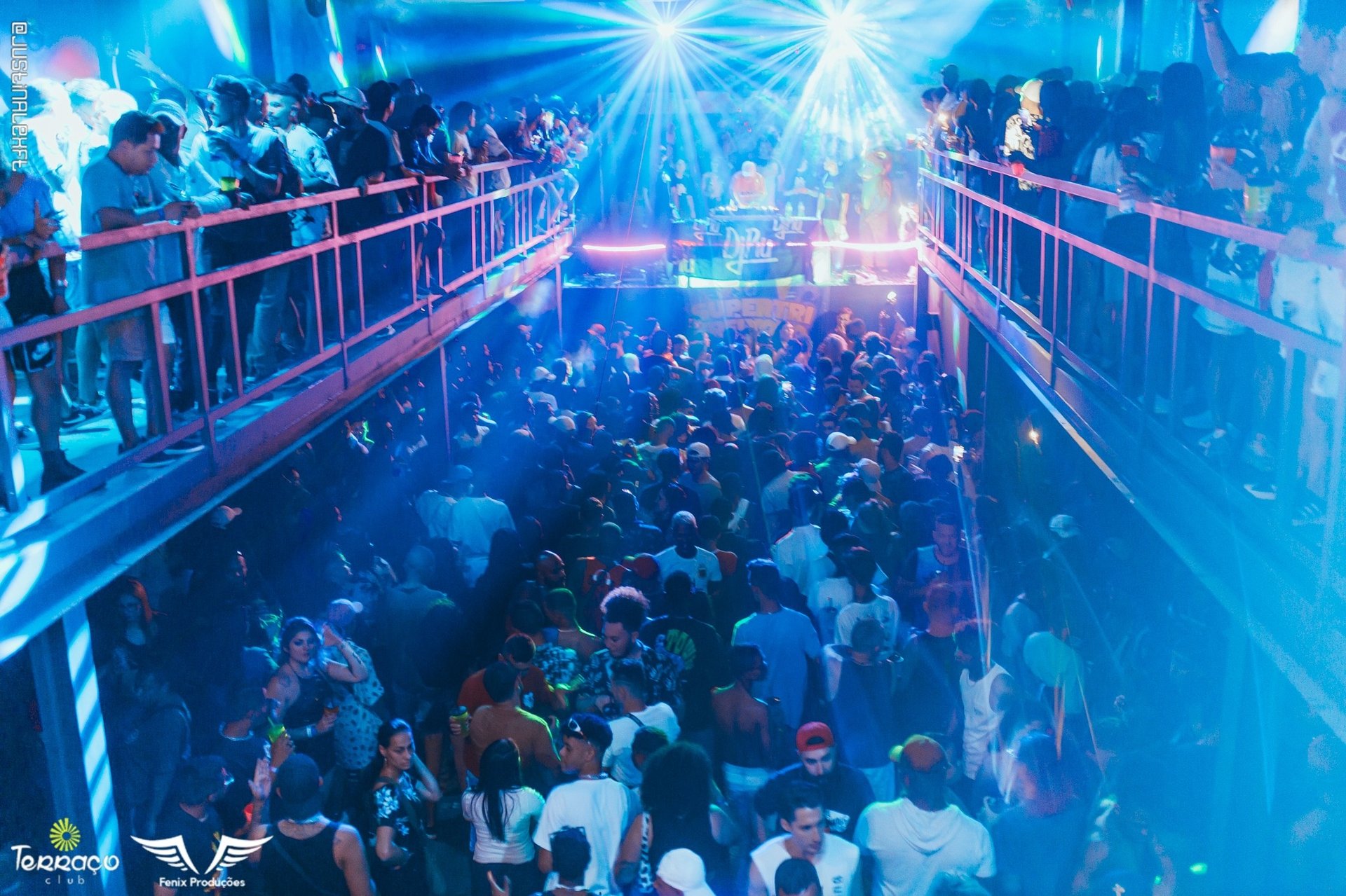 an abstract photo of a curved building with a blue sky in the background