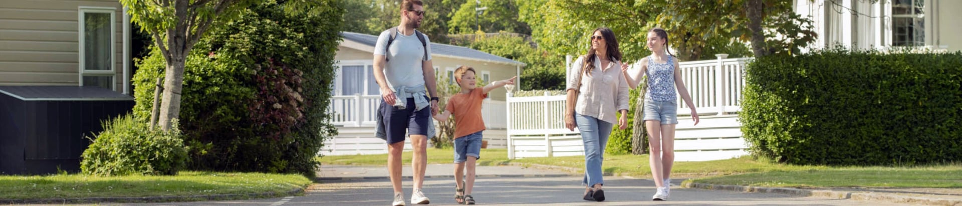 Family in Holiday Park with Holiday Homes