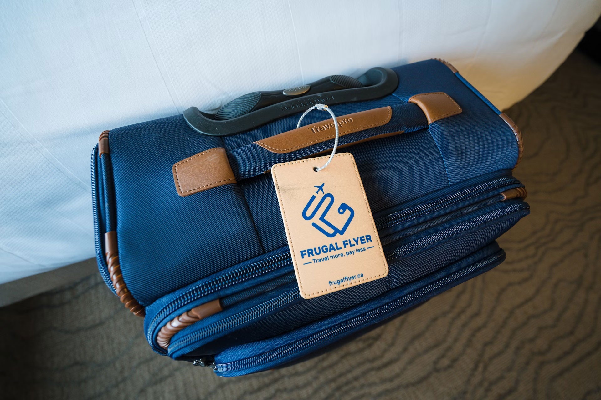 Blue Luggage with Leather Trim