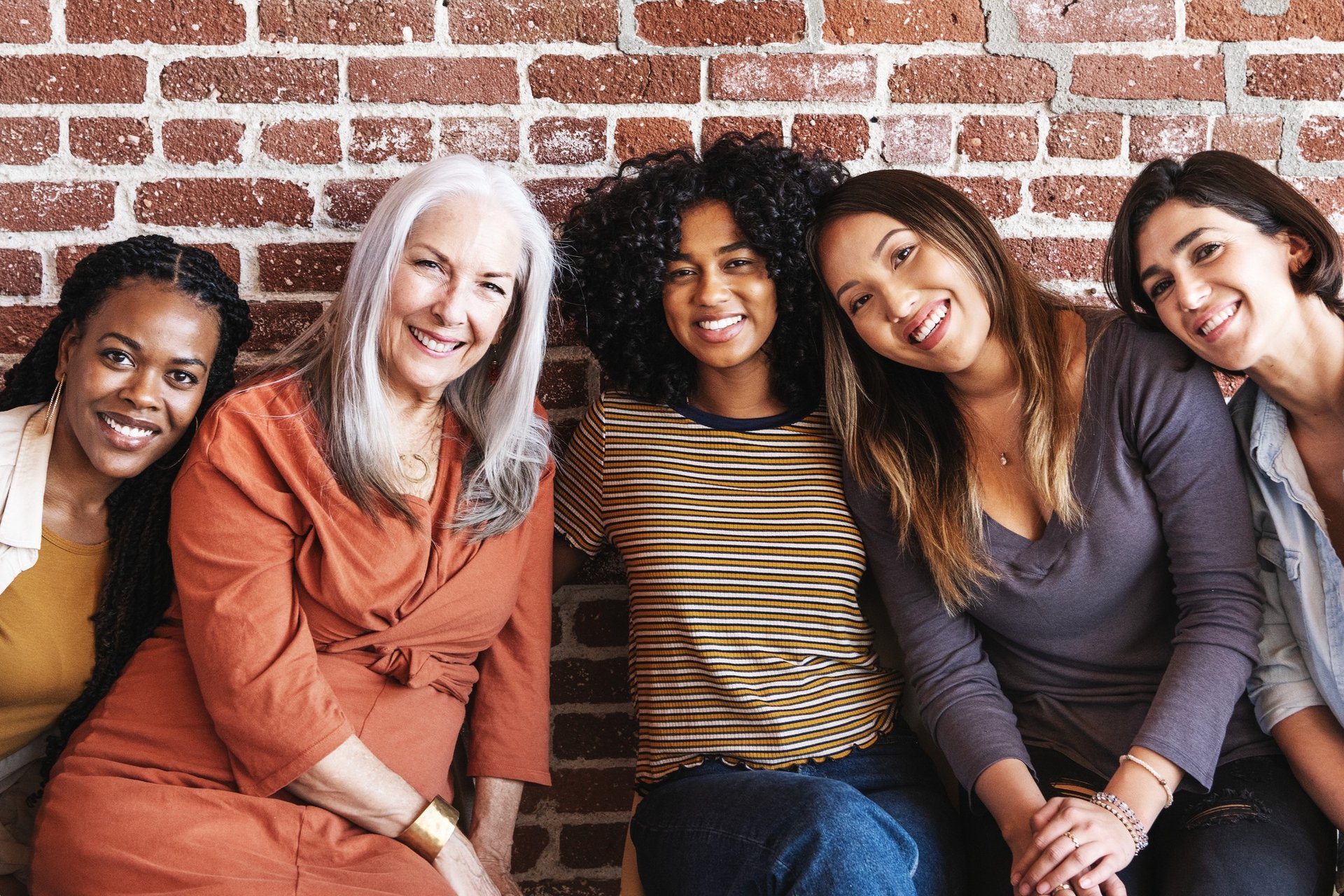 black and brown leather padded tub sofa
