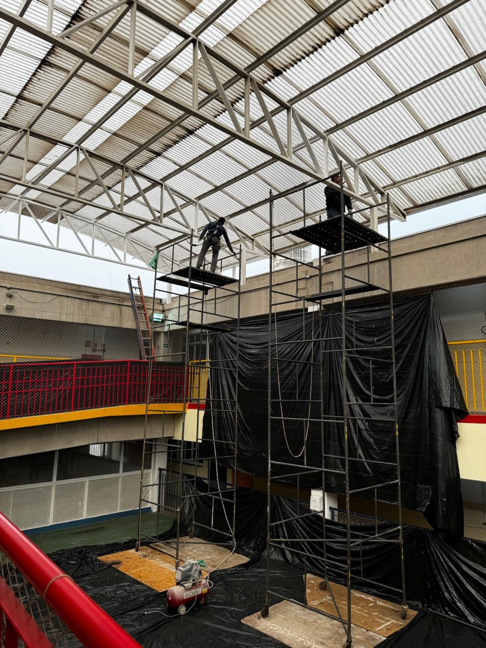 black and brown leather padded tub sofa