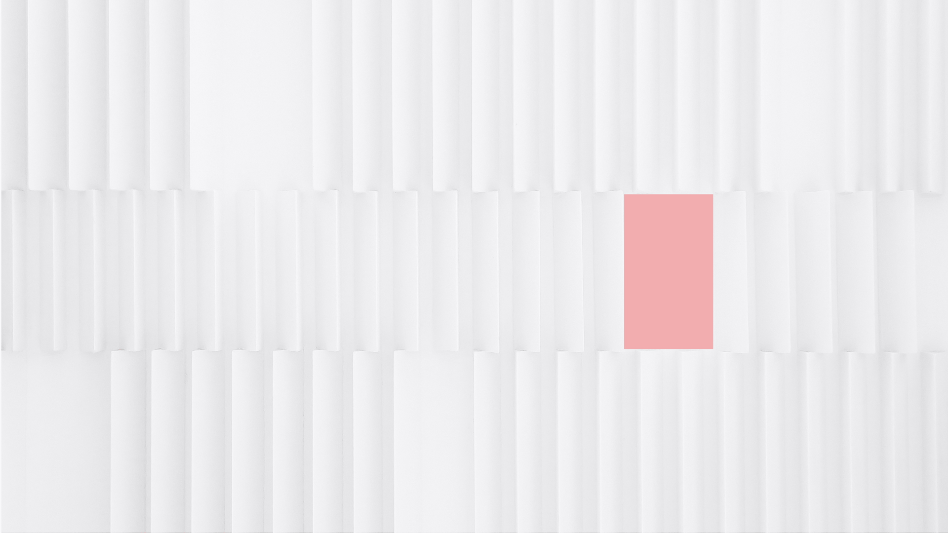 a close up of a white wall with wavy lines