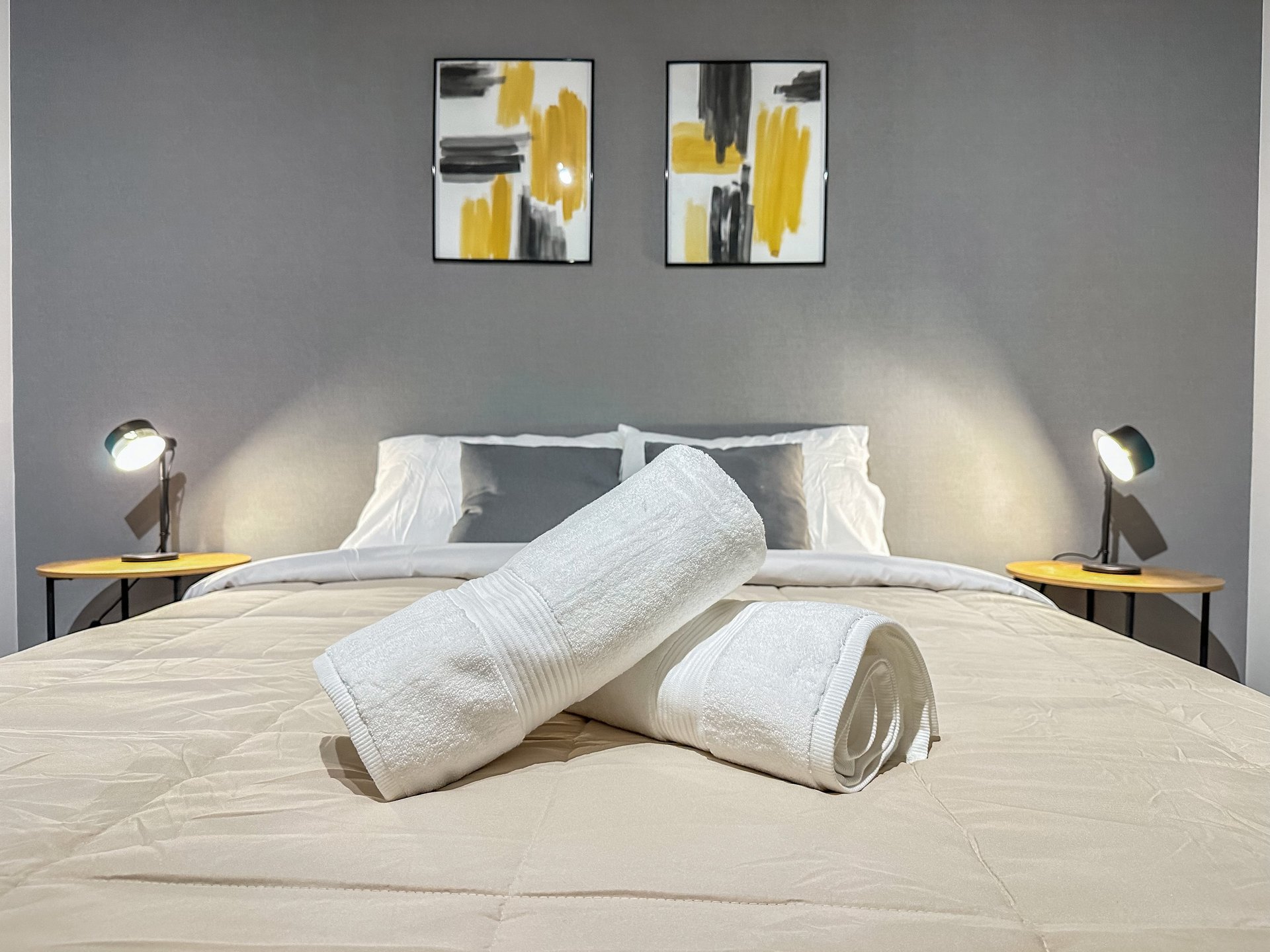 an abstract photo of a curved building with a blue sky in the background