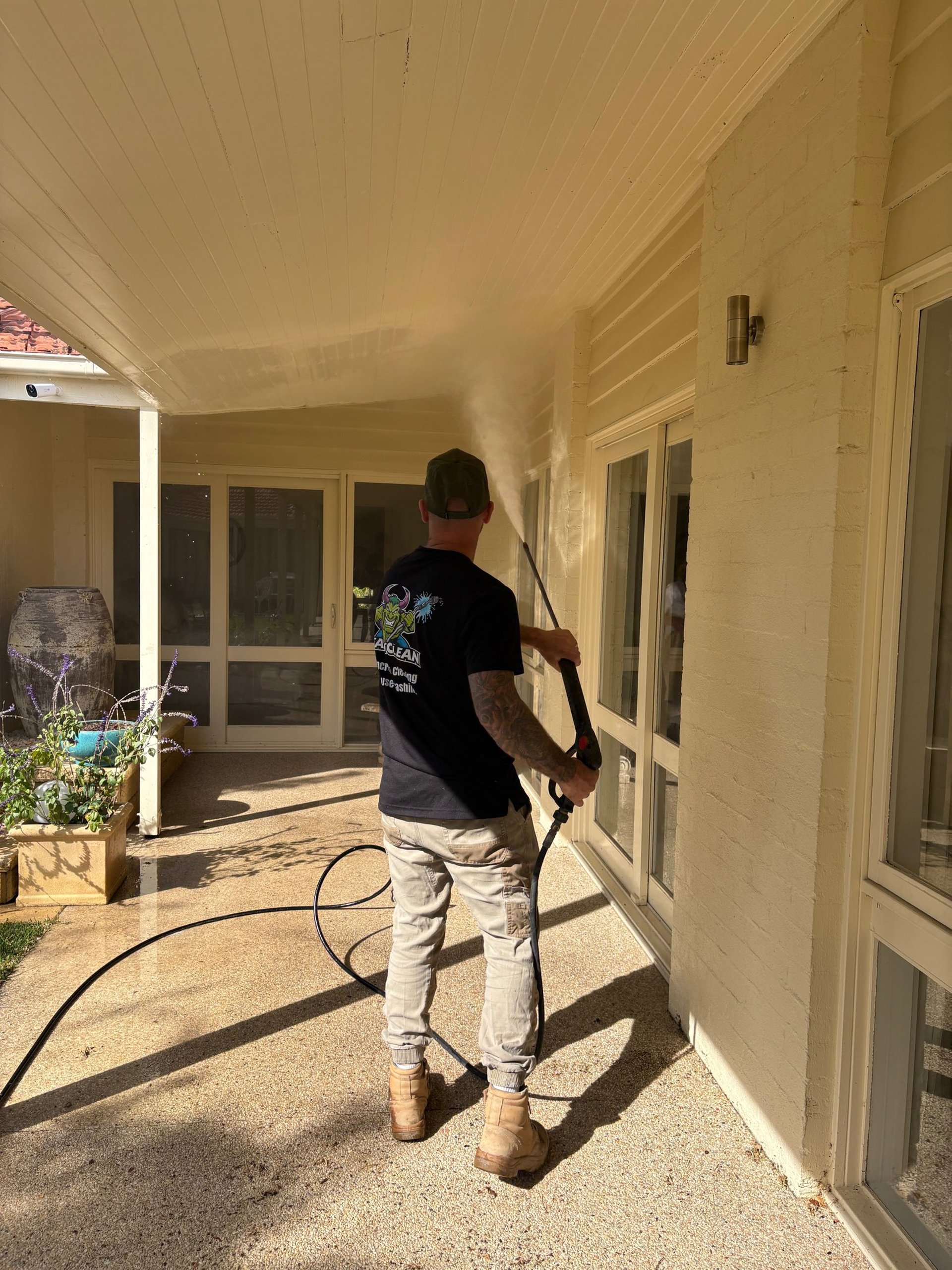 black and brown leather padded tub sofa