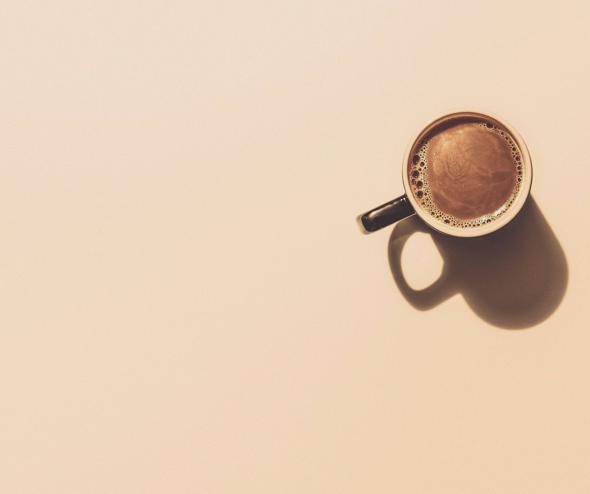 brown ceramic teacup