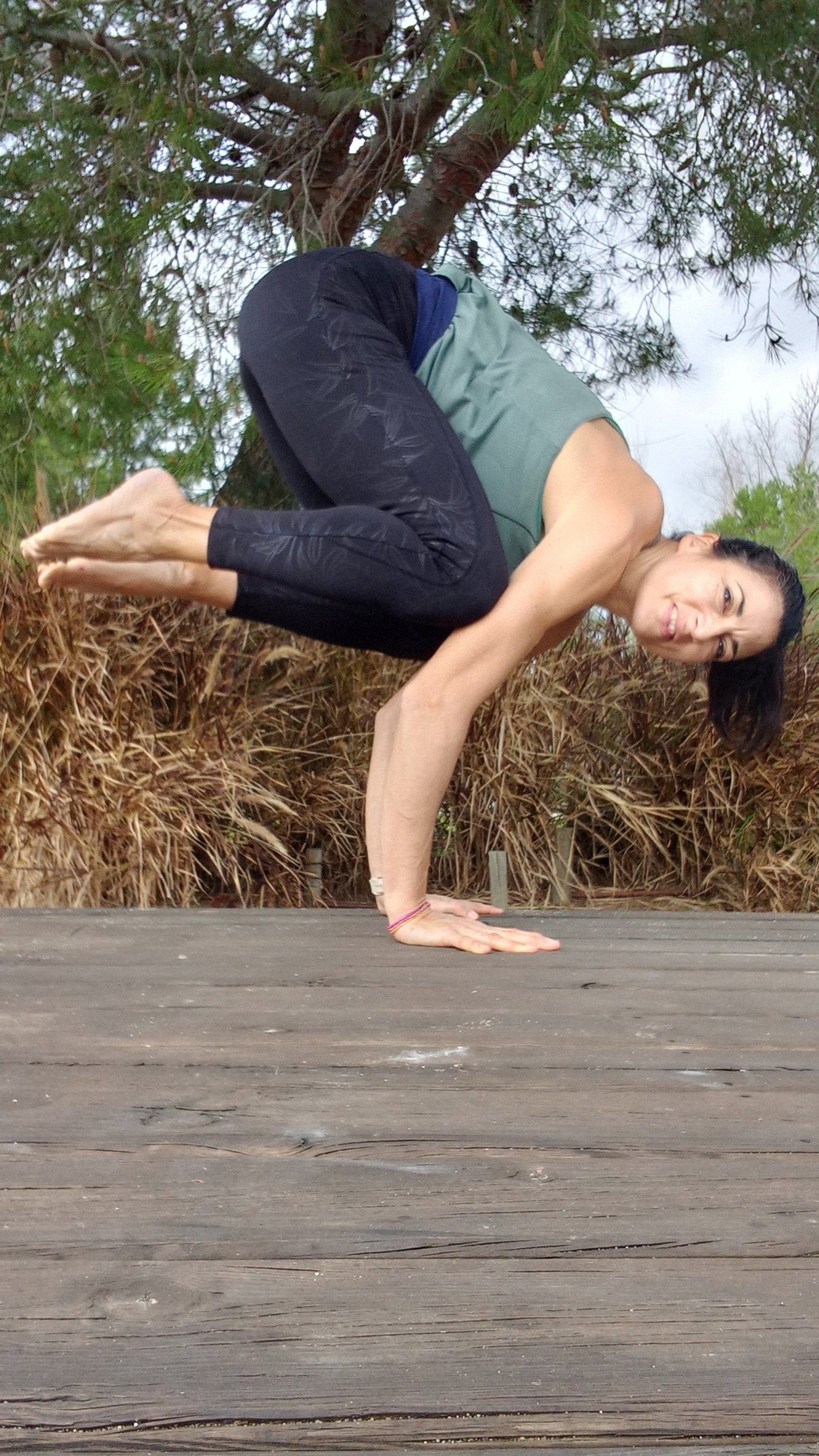 woman wearing yellow long-sleeved dress under white clouds and blue sky during daytime
