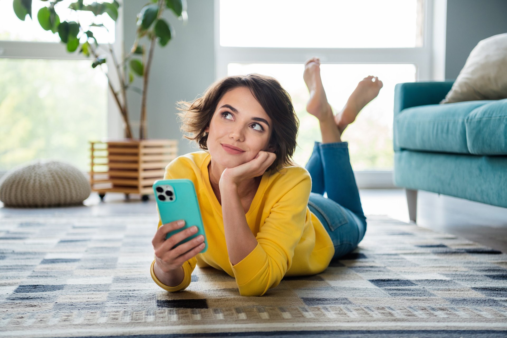 Young woman pondering questions about luxury car leases