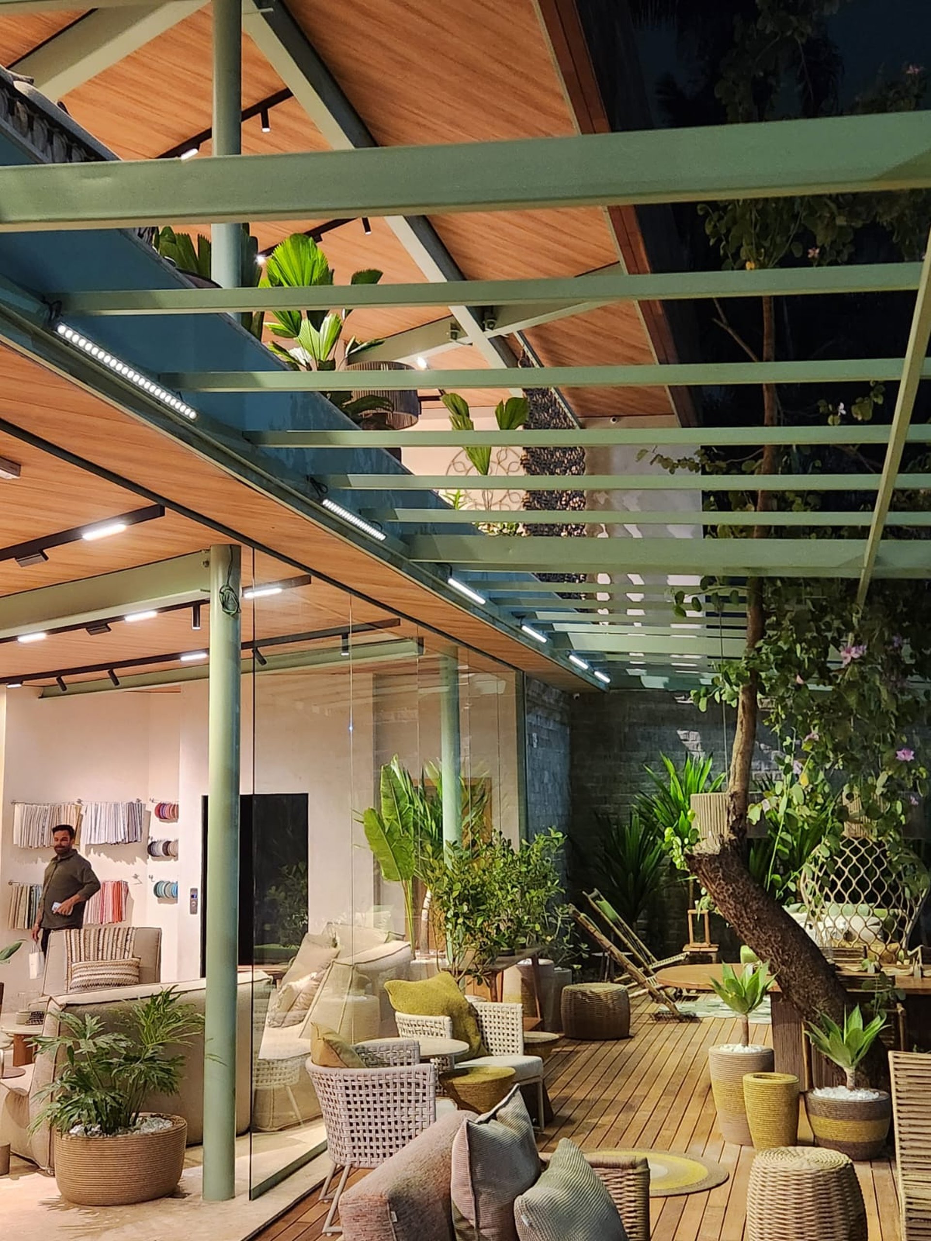 an abstract photo of a curved building with a blue sky in the background