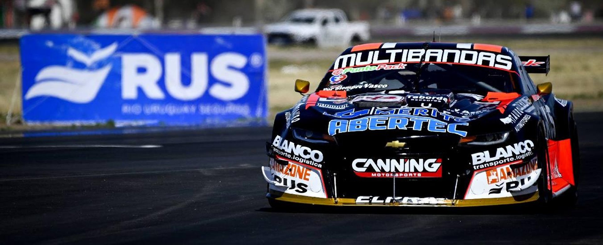 black and brown leather padded tub sofa