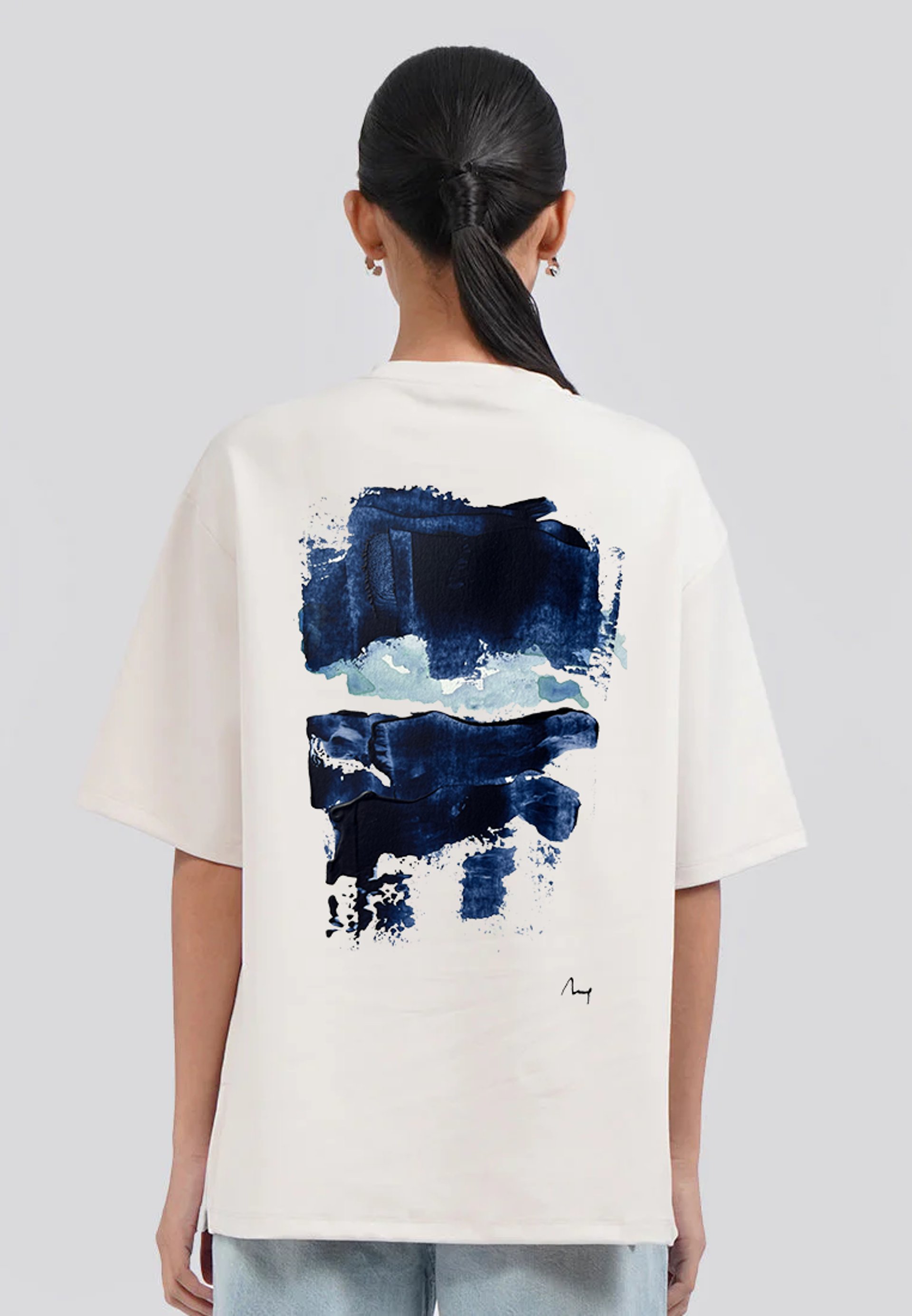 an abstract photo of a curved building with a blue sky in the background