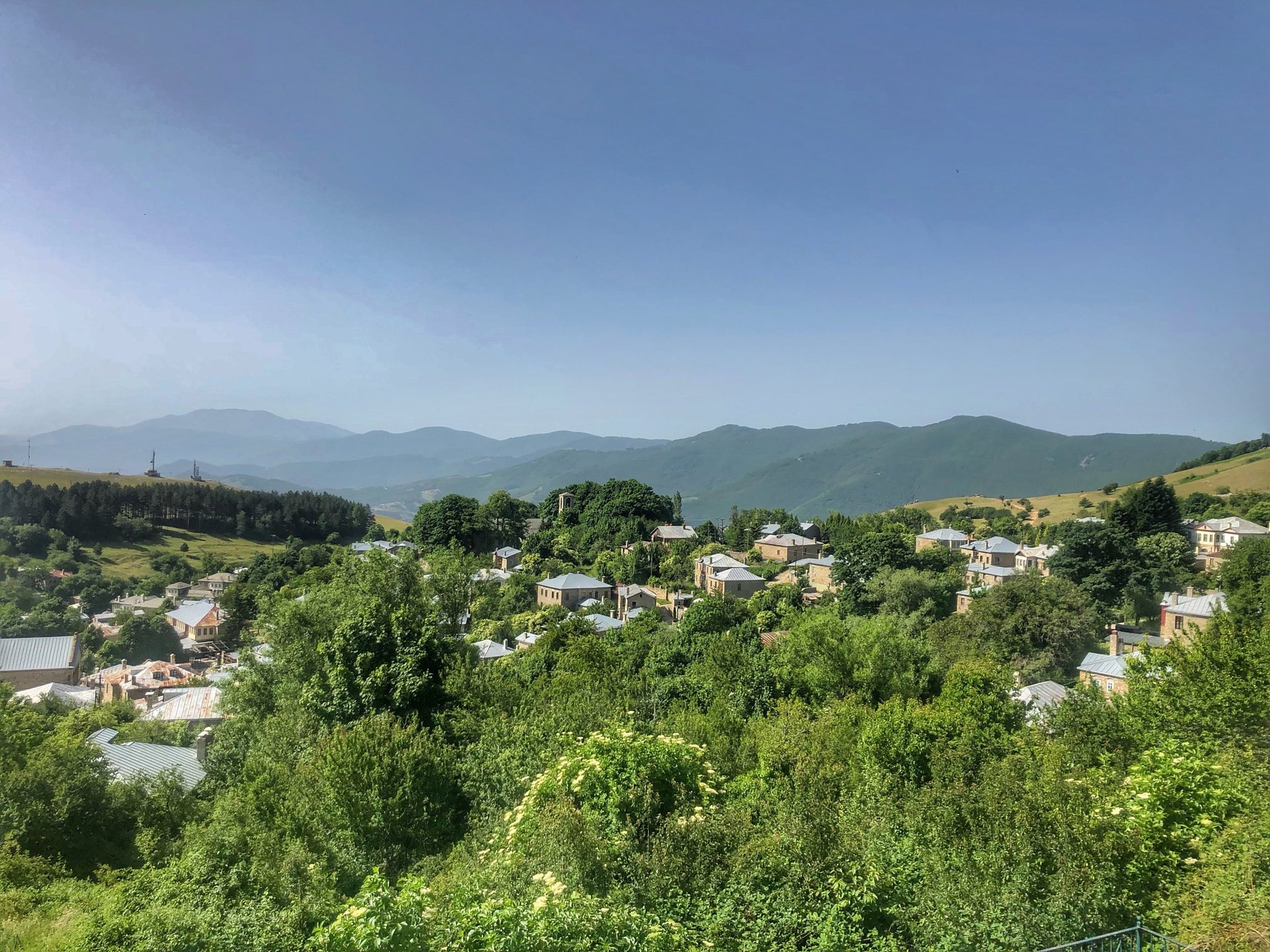 black and brown leather padded tub sofa