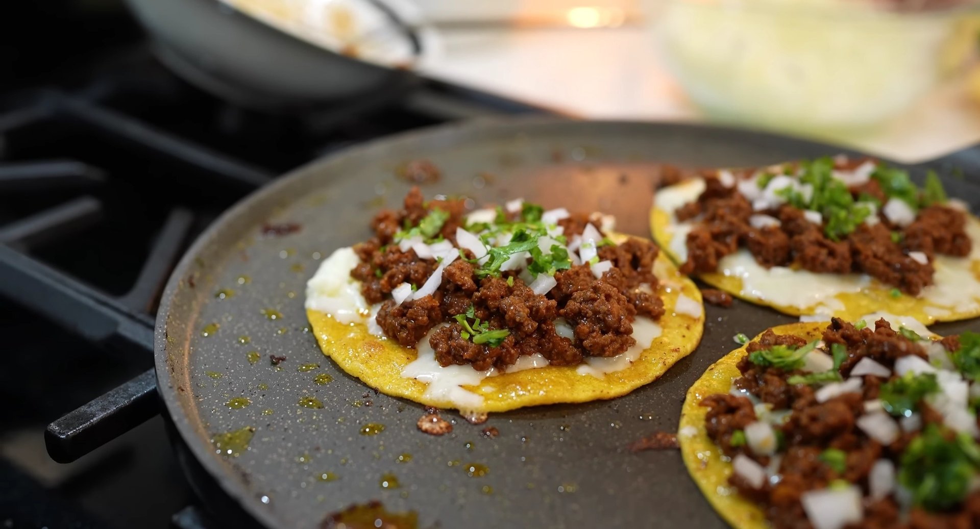 Cheesy Ground Beef Crunchy Tacos: A Flavor Fiesta is a mouthwatering delight featuring seasoned ground beef