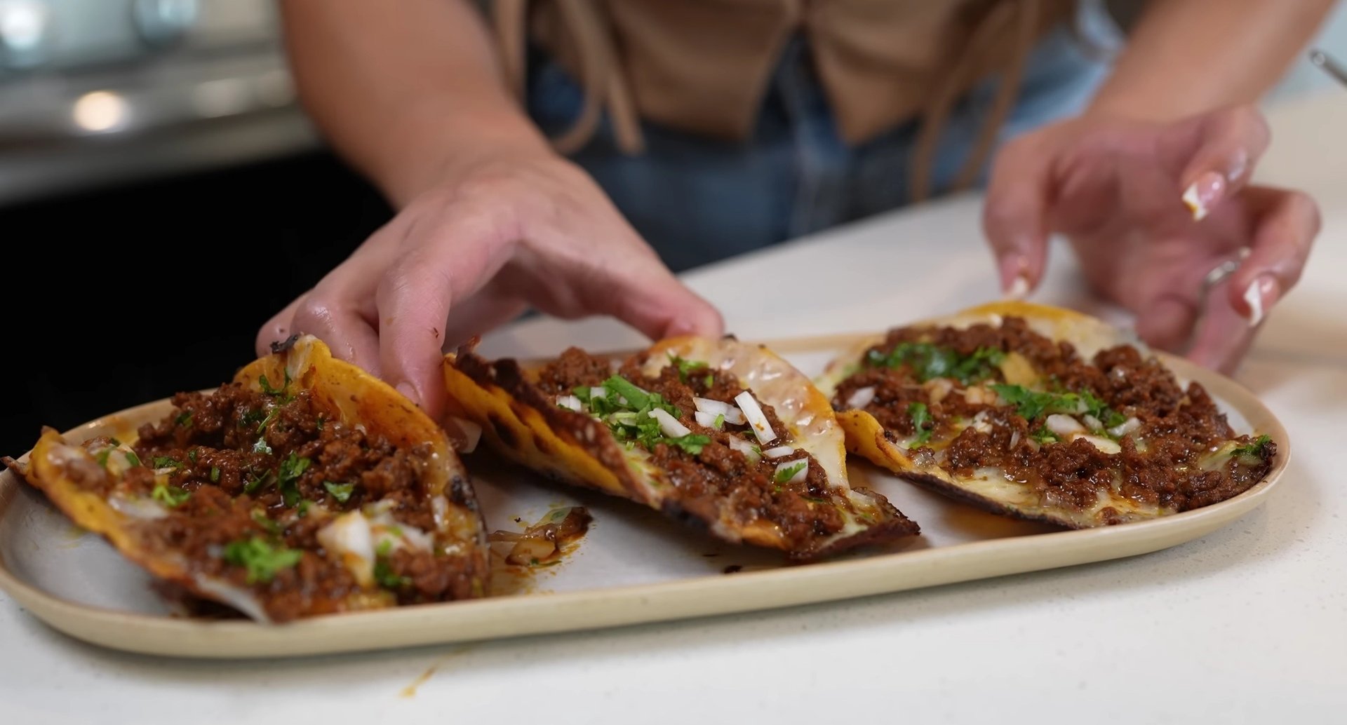 Cheesy Ground Beef Crunchy Tacos: A Flavor Fiesta is a mouthwatering delight featuring seasoned ground beef