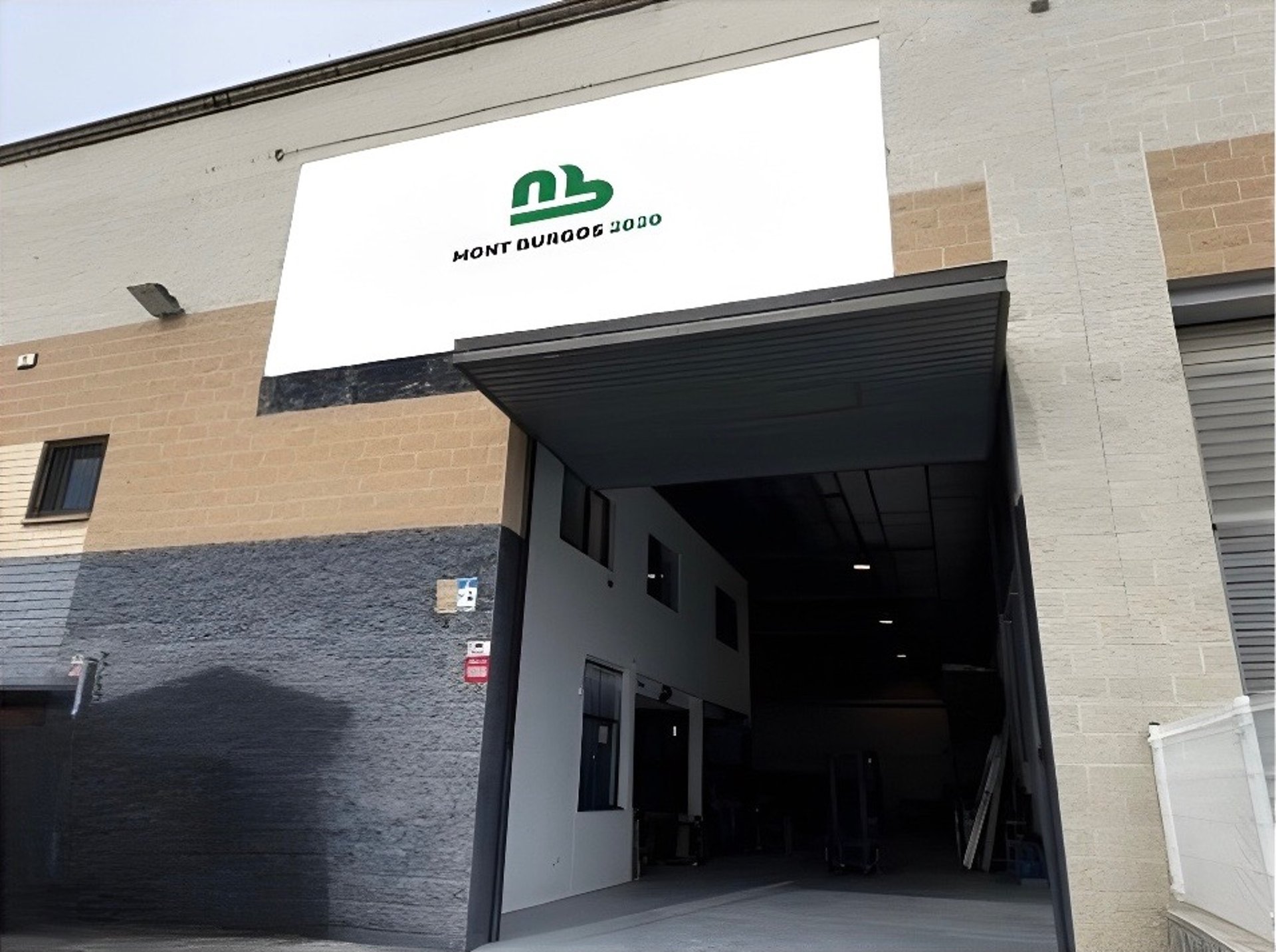 black and brown leather padded tub sofa