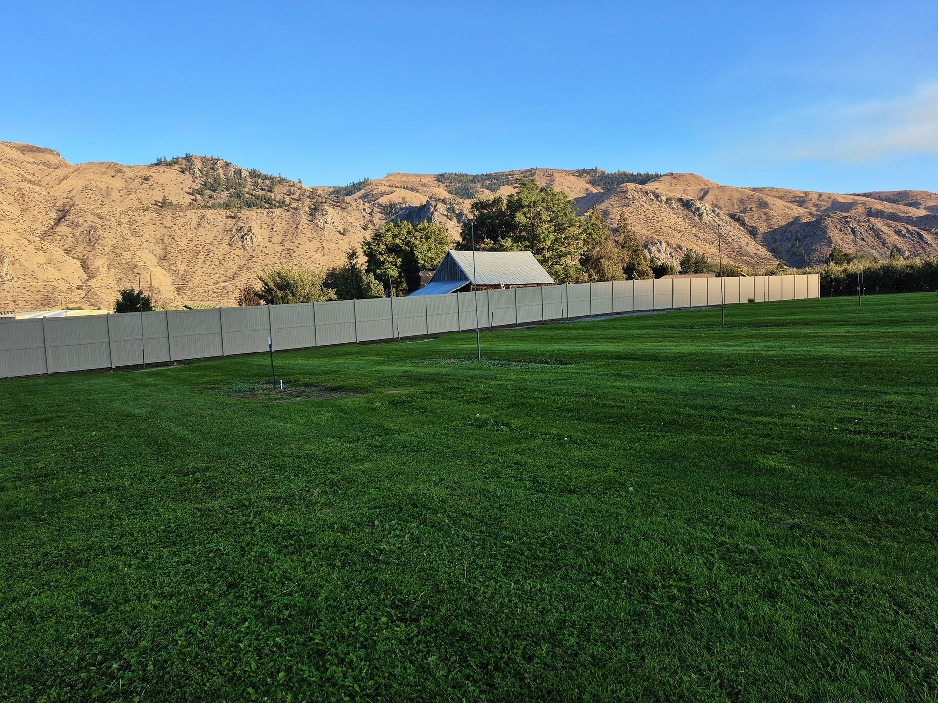black and brown leather padded tub sofa