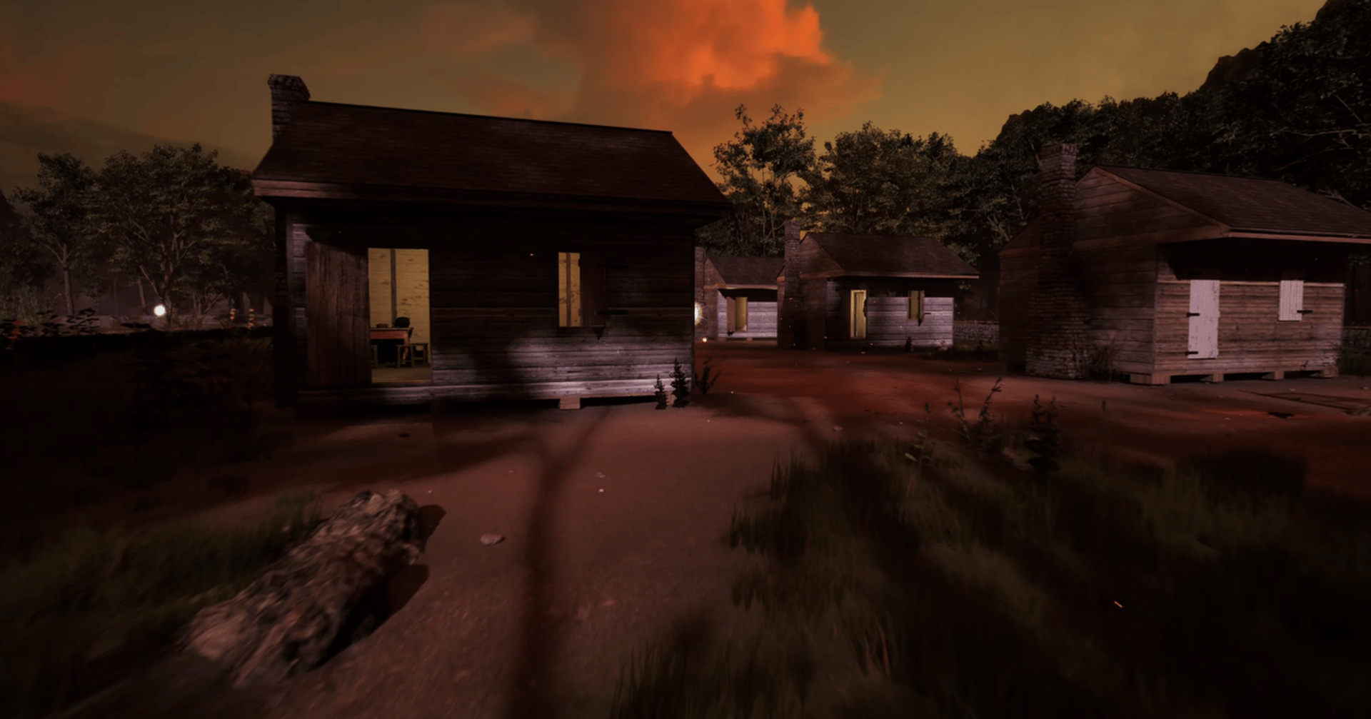 Coded Black gameplay screenshot showing slave quarters on a plantation with a series of small wooden slave houses.