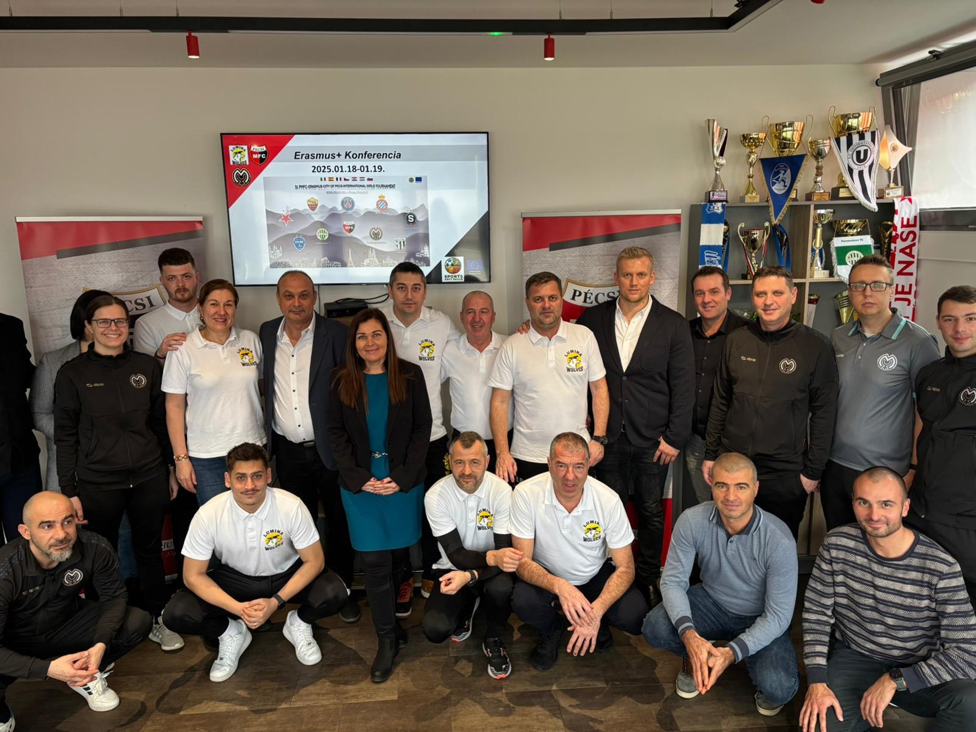group of men playing soccer during daytime