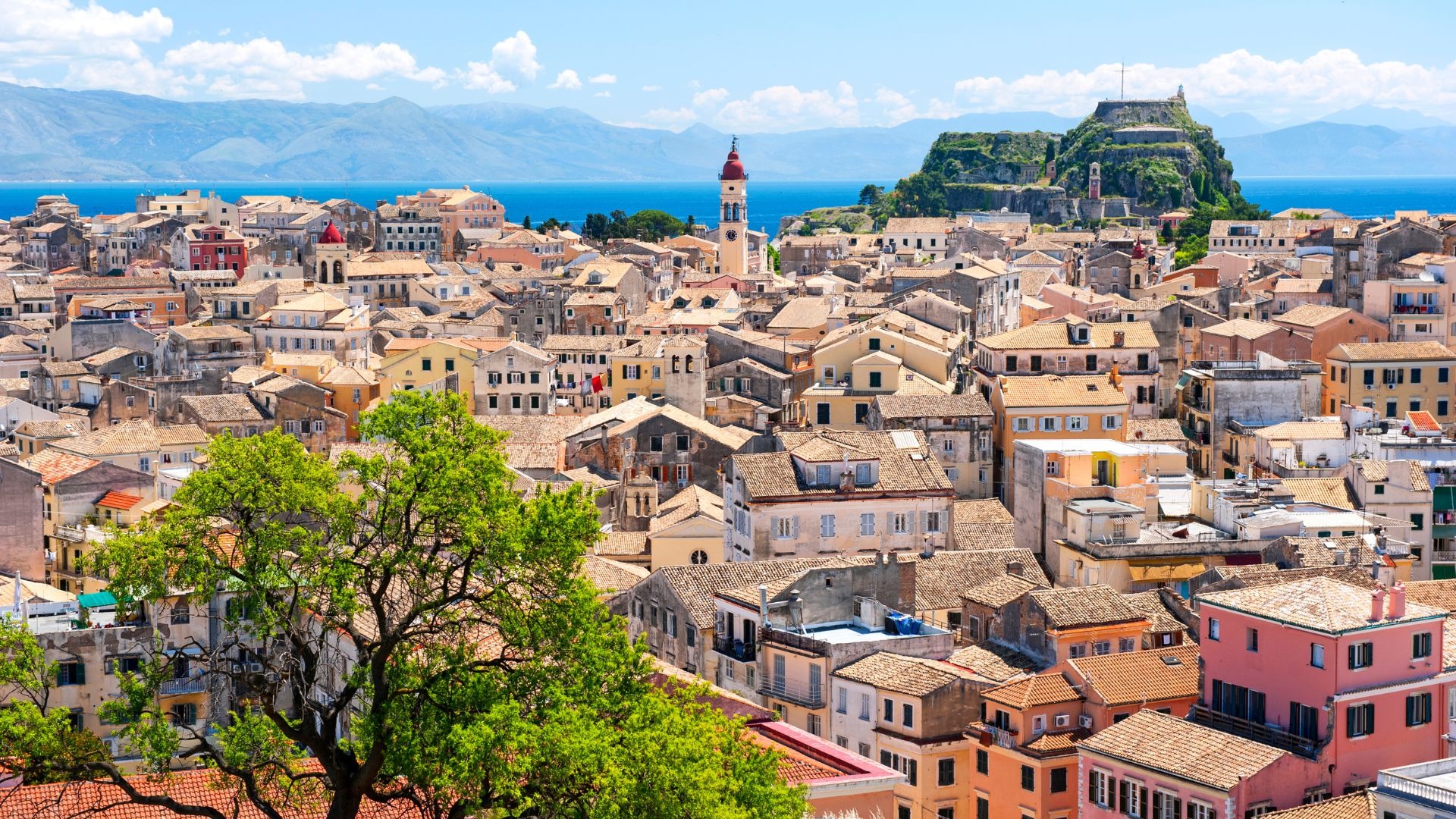 an abstract photo of a curved building with a blue sky in the background