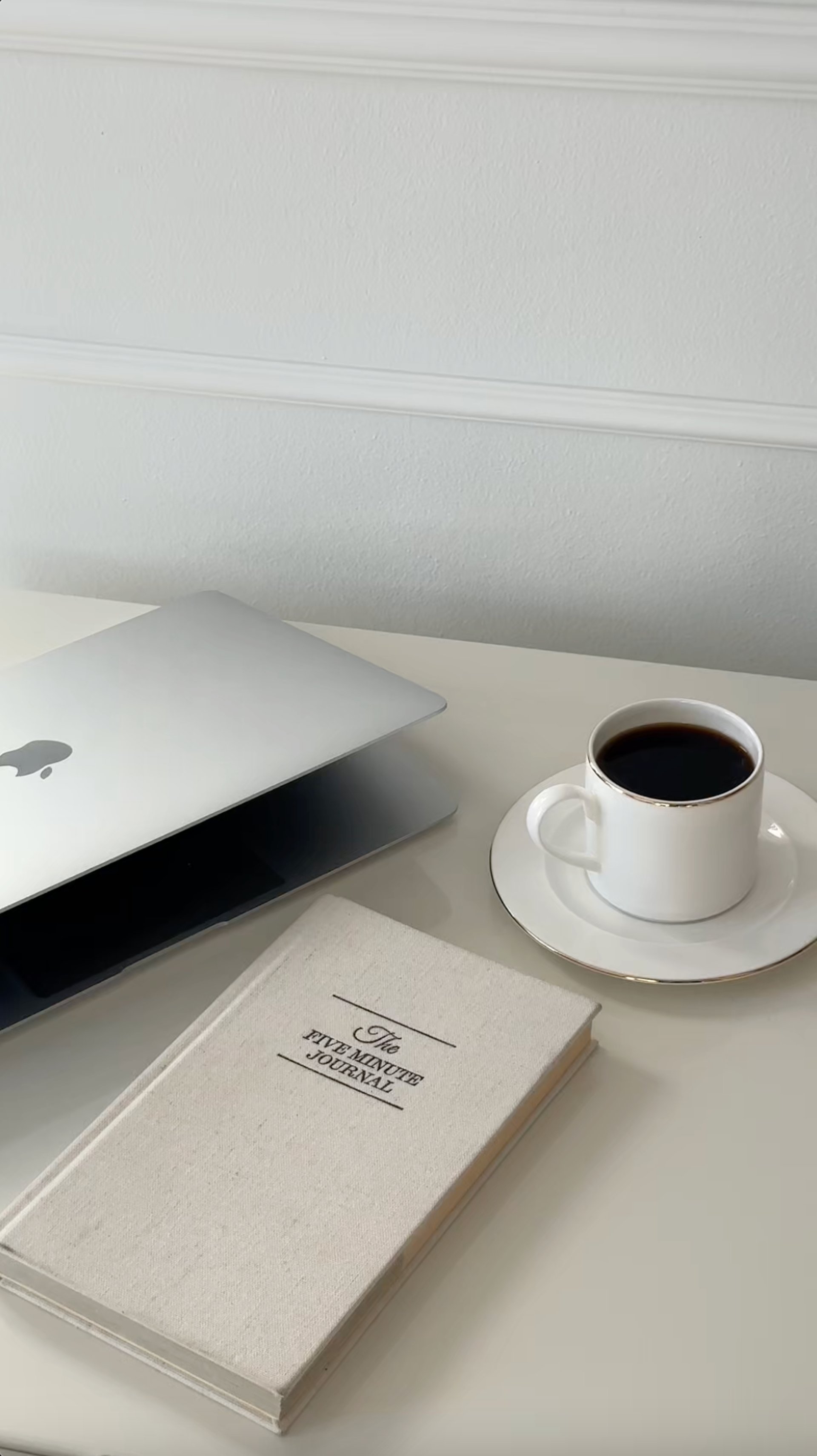 brown and white wooden desk with chair and laptop