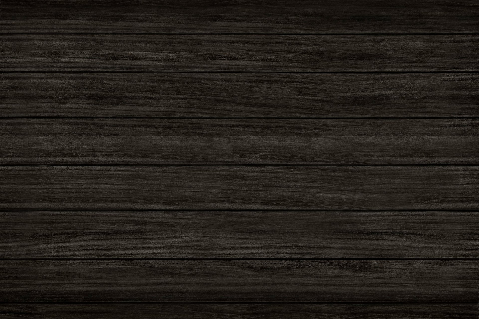 brown wooden surface with white and black textile