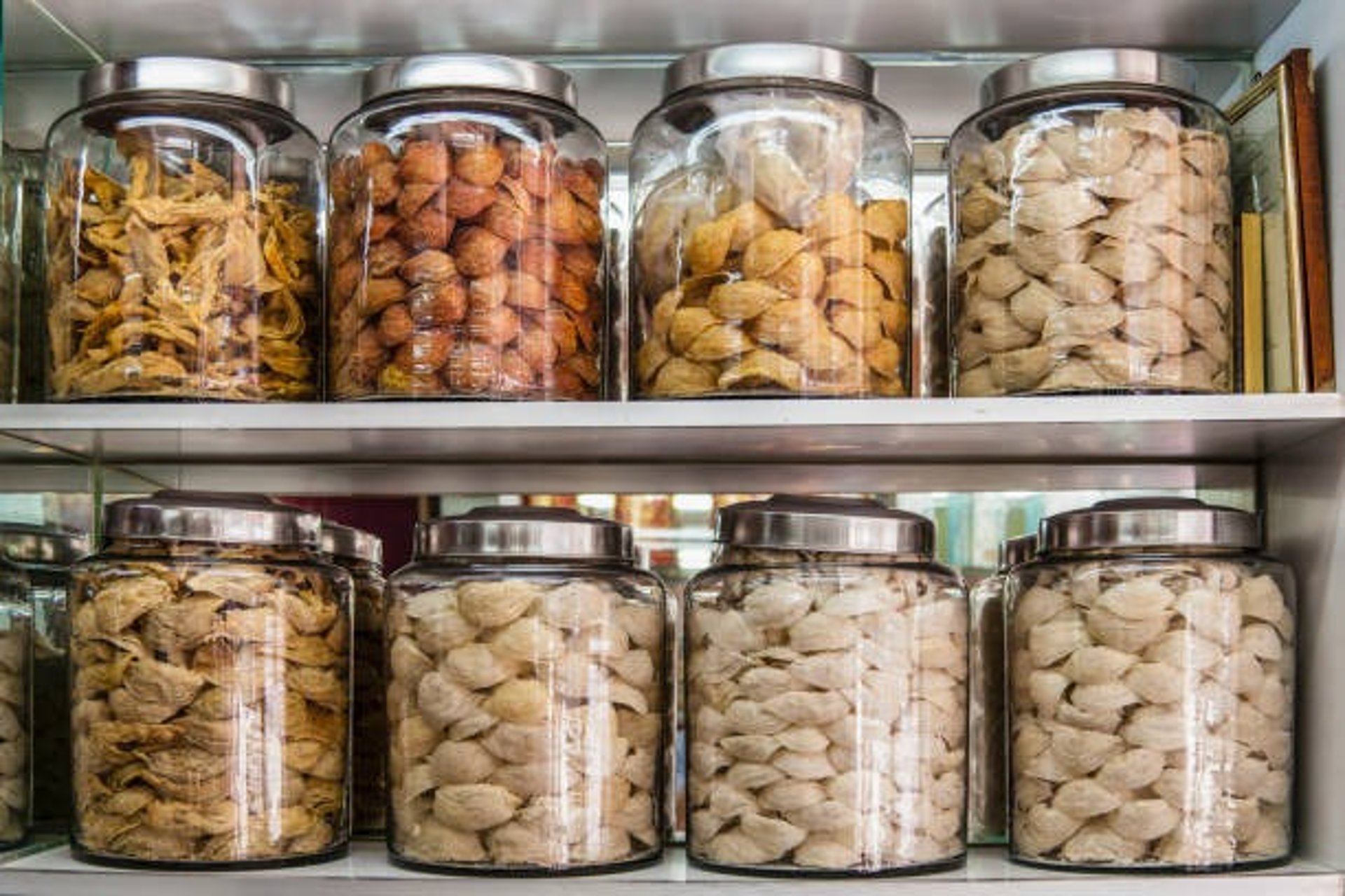 woman wearing yellow long-sleeved dress under white clouds and blue sky during daytime