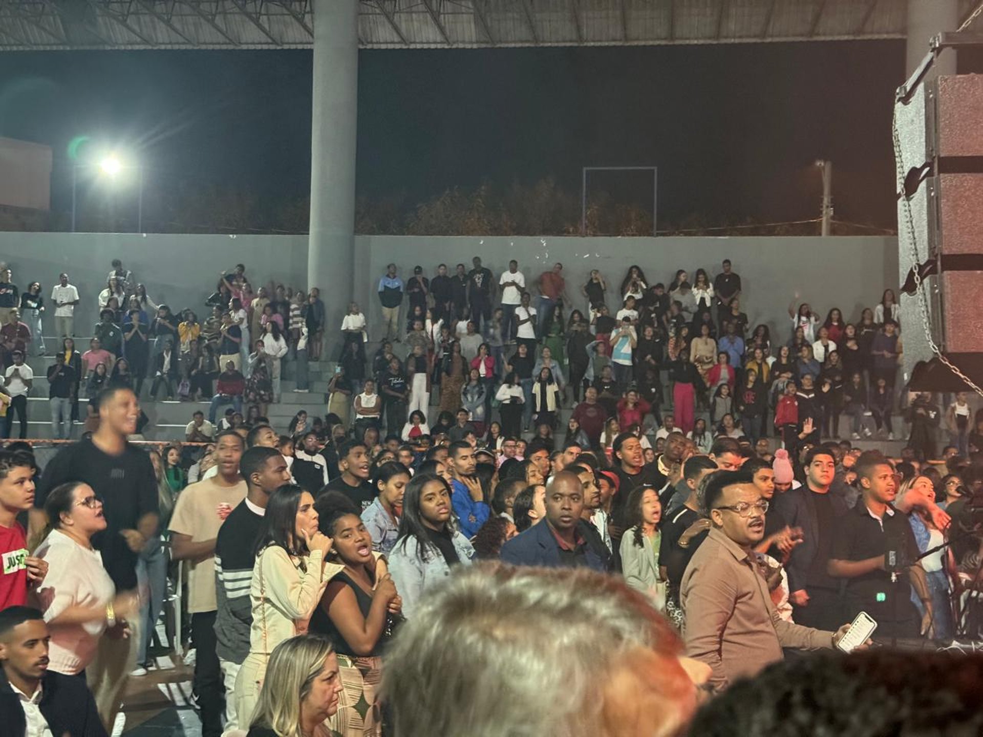 an abstract photo of a curved building with a blue sky in the background