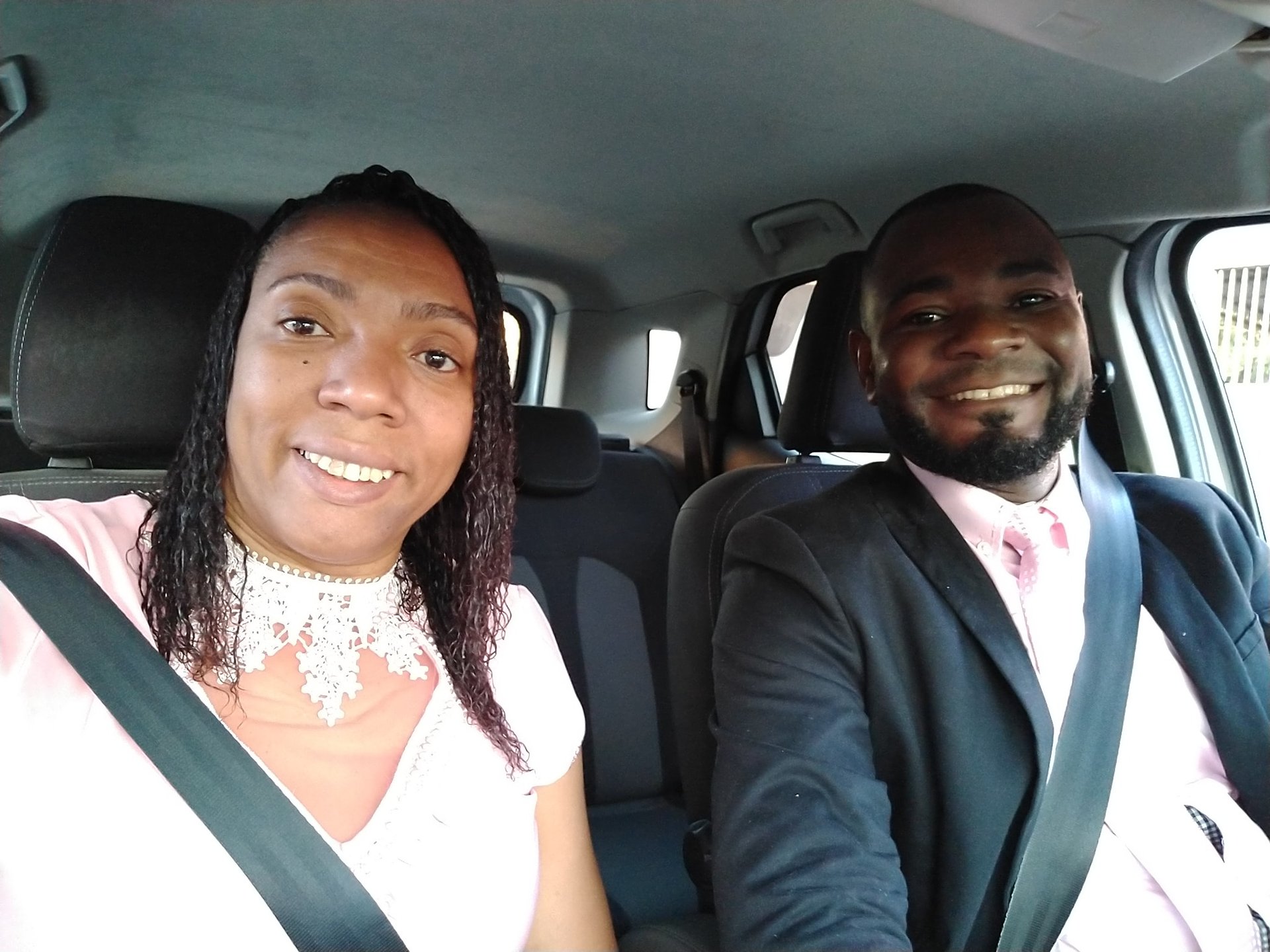 an abstract photo of a curved building with a blue sky in the background
