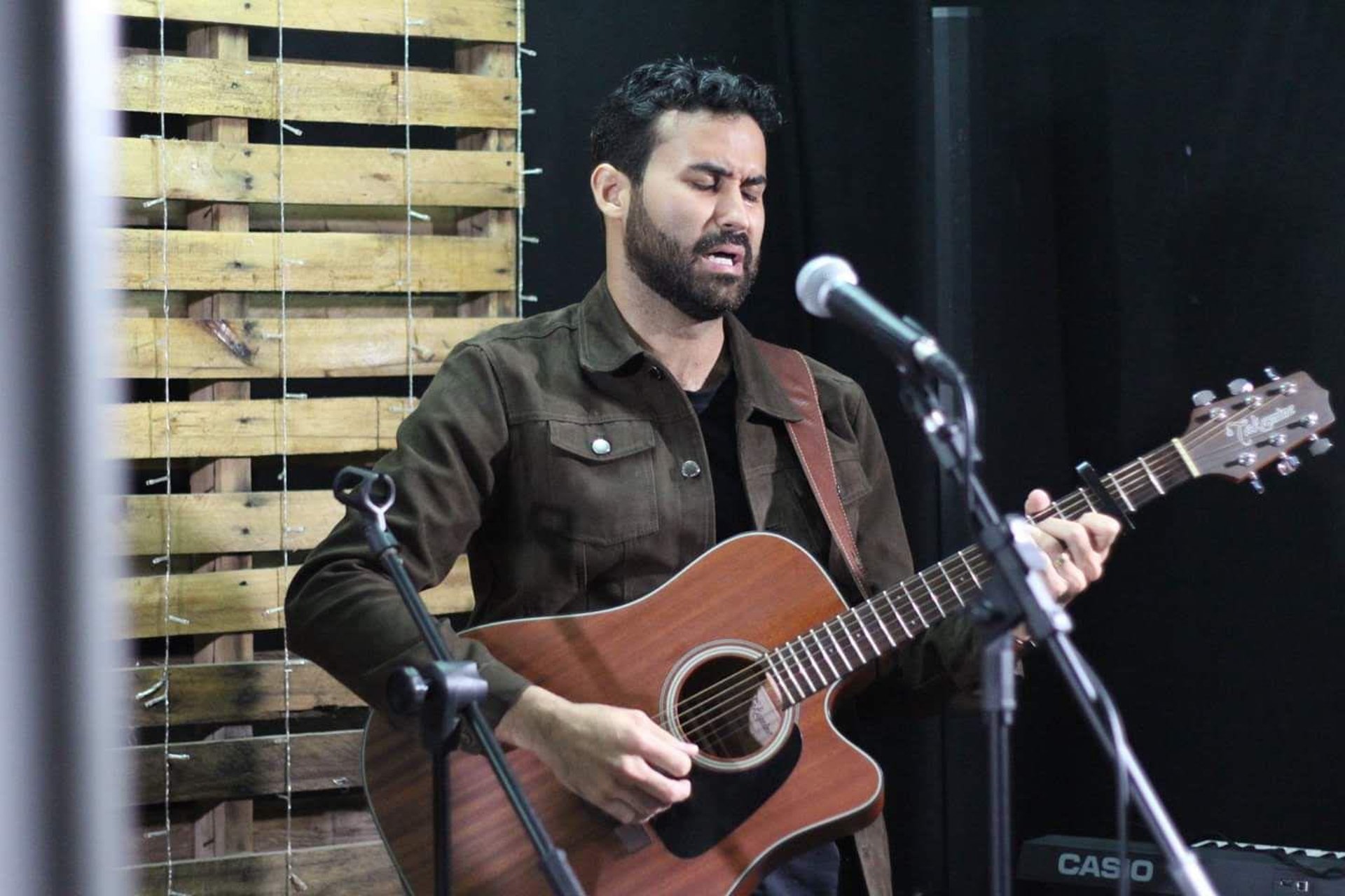 woman wearing yellow long-sleeved dress under white clouds and blue sky during daytime