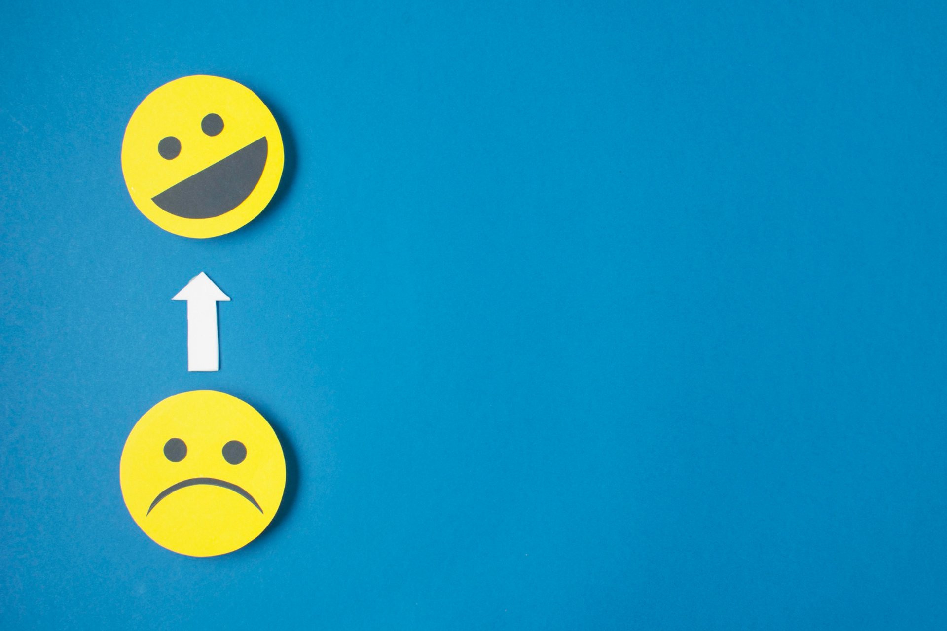 an abstract photo of a curved building with a blue sky in the background