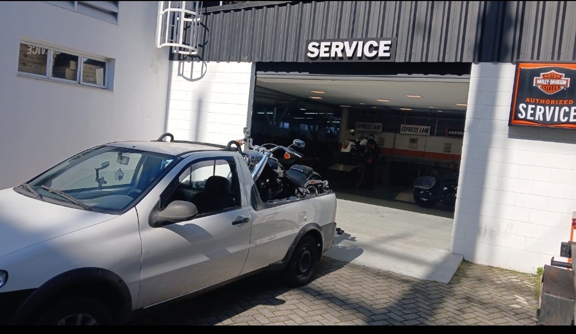 an abstract photo of a curved building with a blue sky in the background