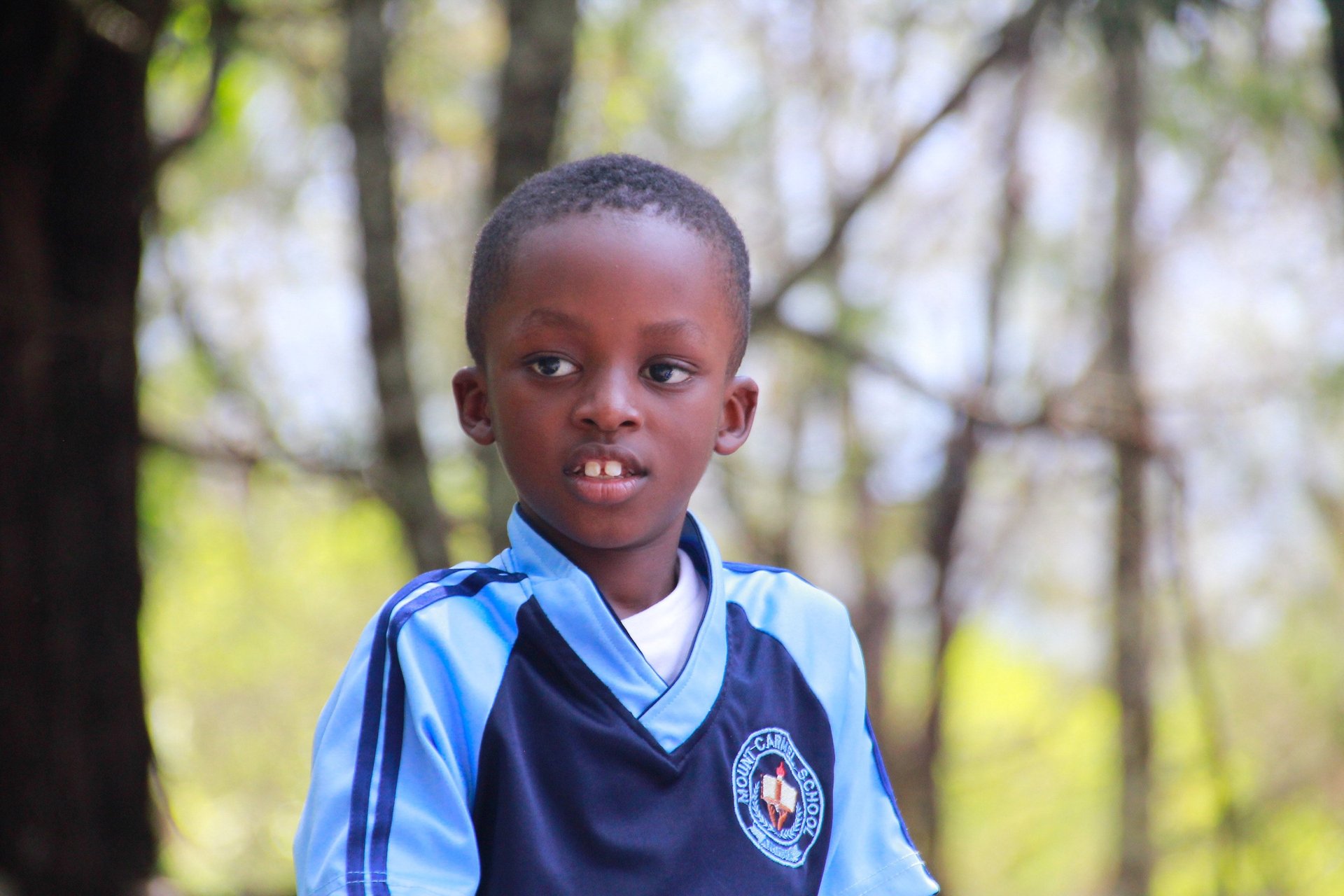 an abstract photo of a curved building with a blue sky in the background