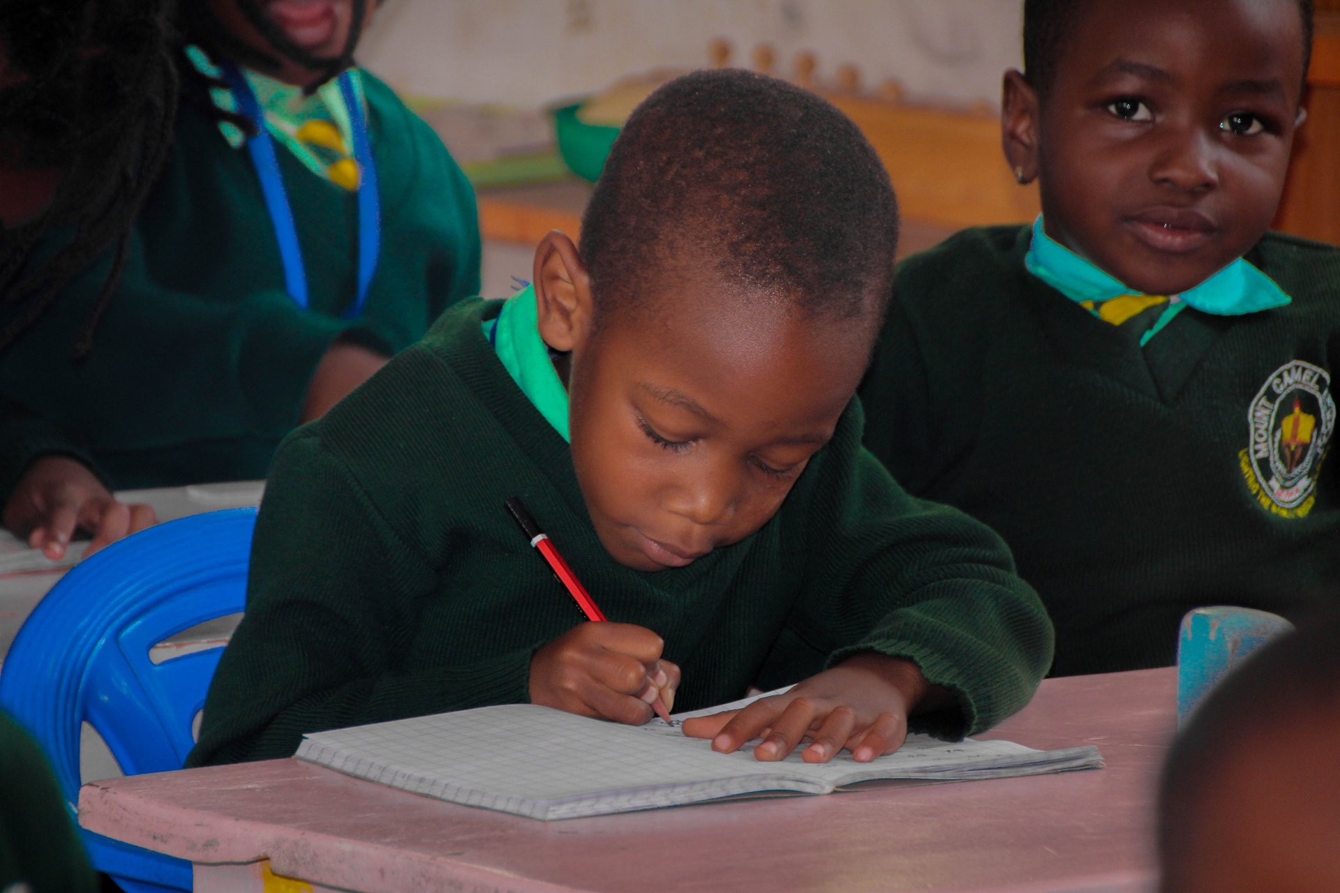 an abstract photo of a curved building with a blue sky in the background