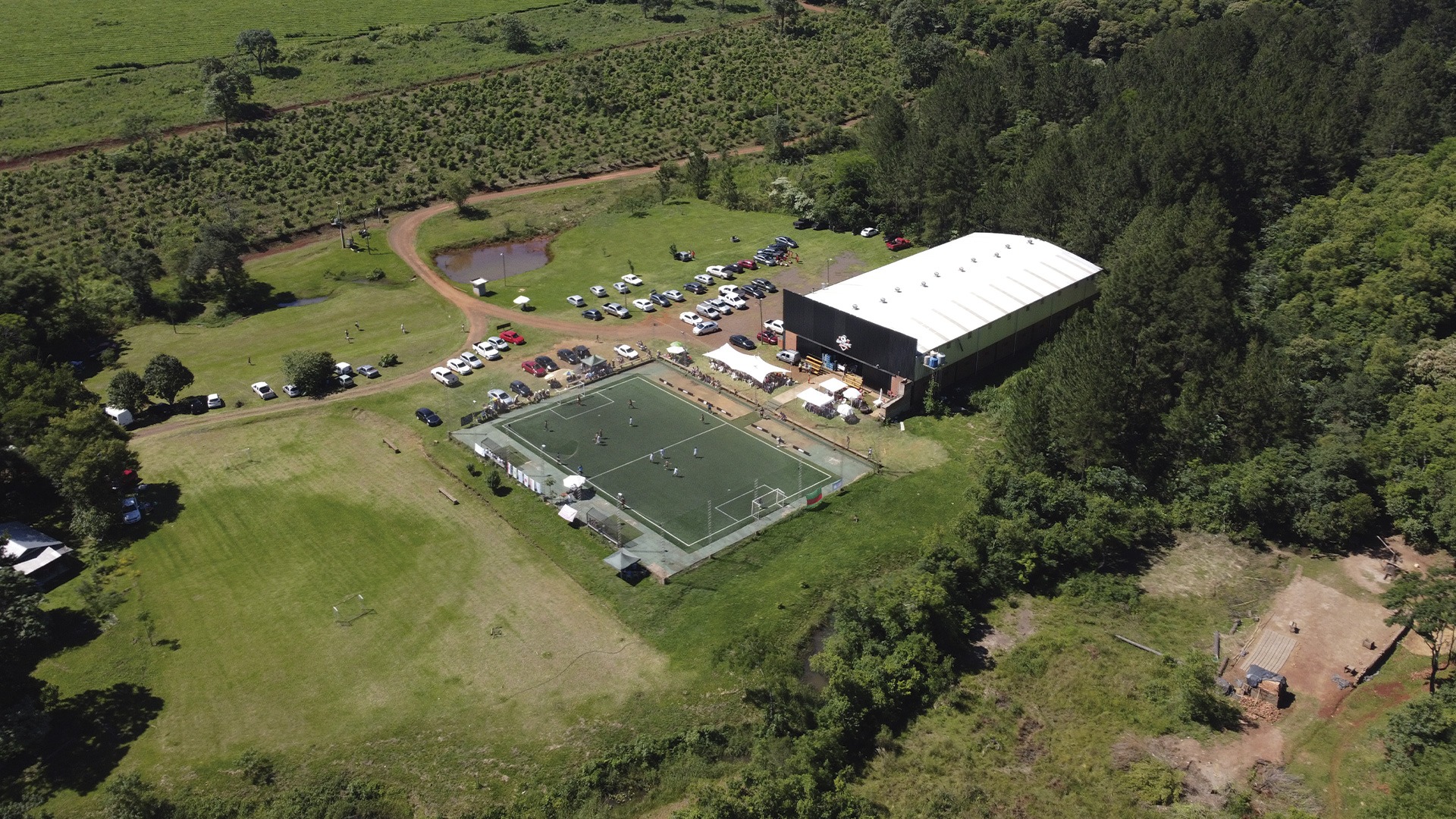 an abstract photo of a curved building with a blue sky in the background