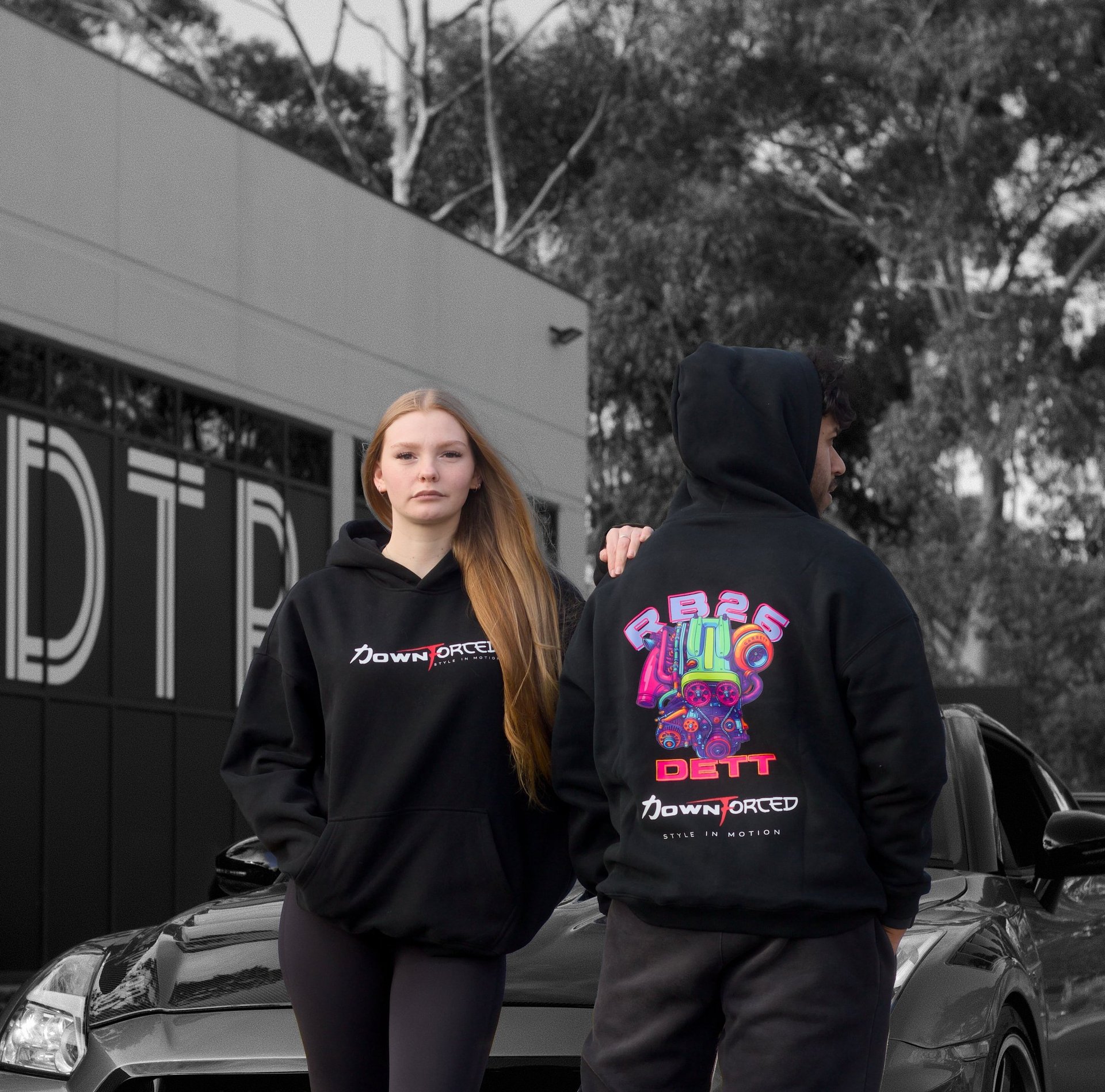 black porsche 911 parked in a parking lot