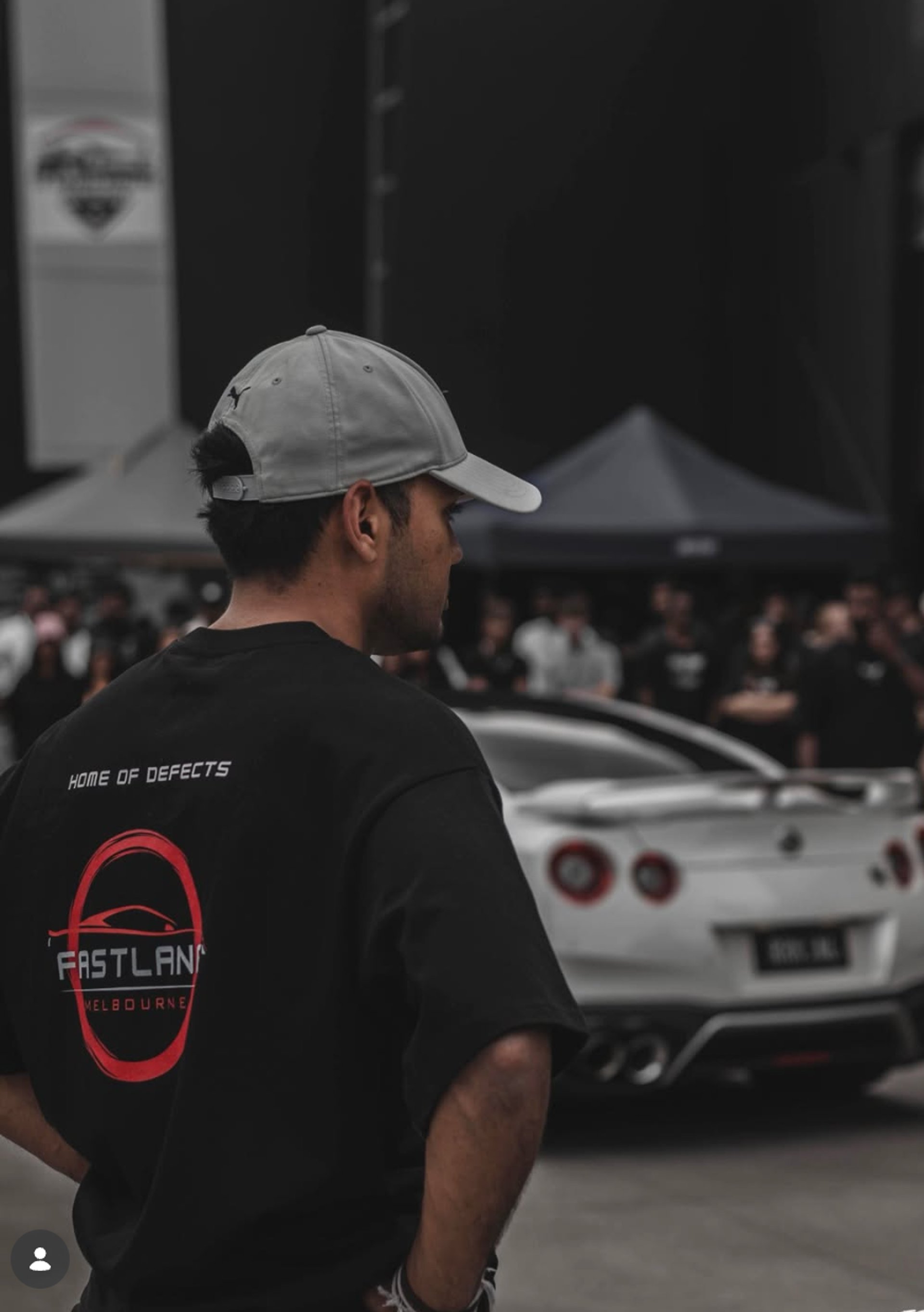 an abstract photo of a curved building with a blue sky in the background