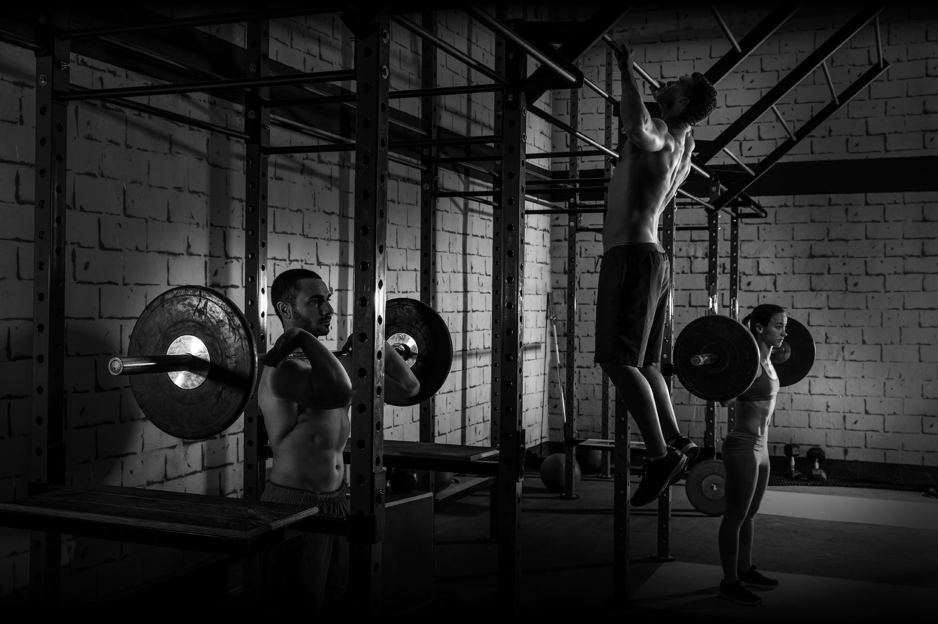 A large gym with a lot of machines