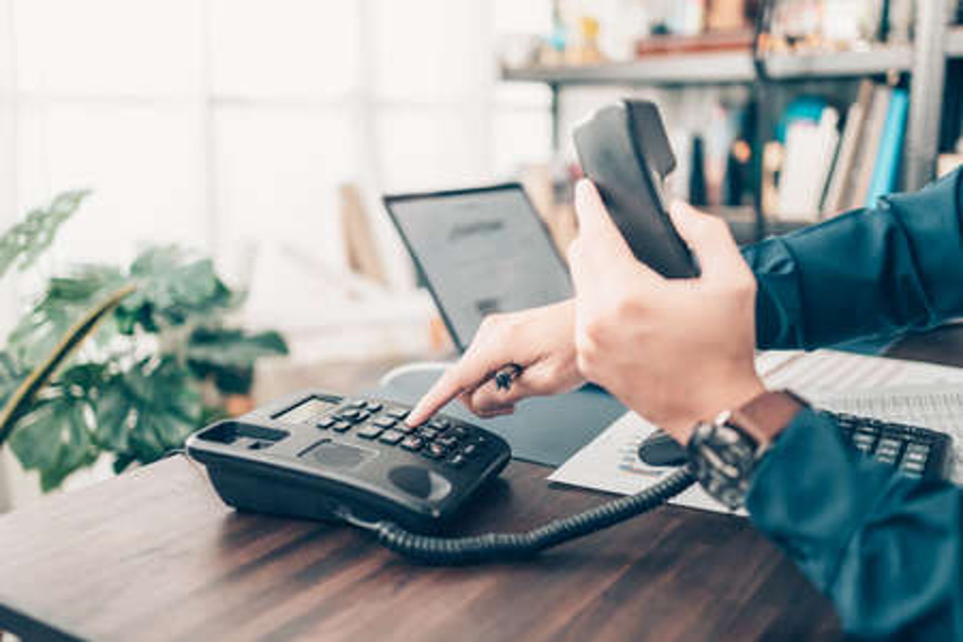 person writing on white paper