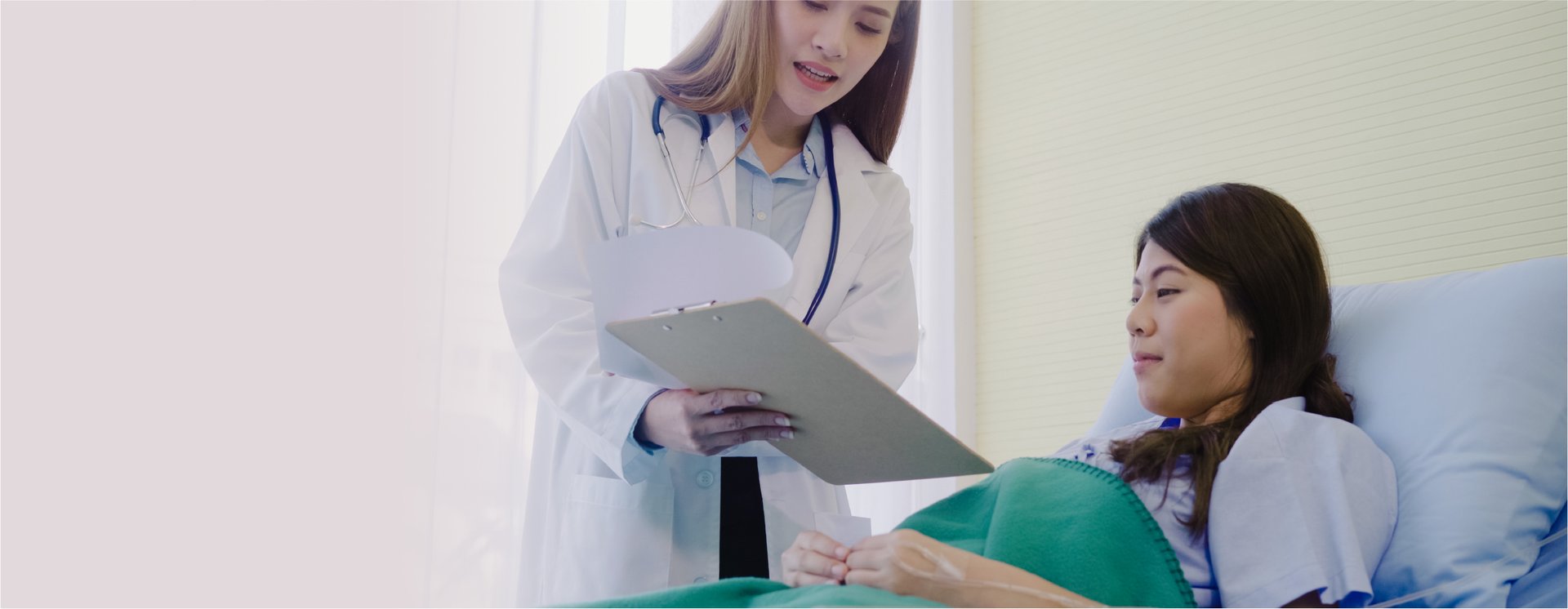 an abstract photo of a curved building with a blue sky in the background